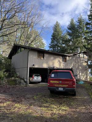 Residential Roof Cleaning in Progress in Bainbridge Island