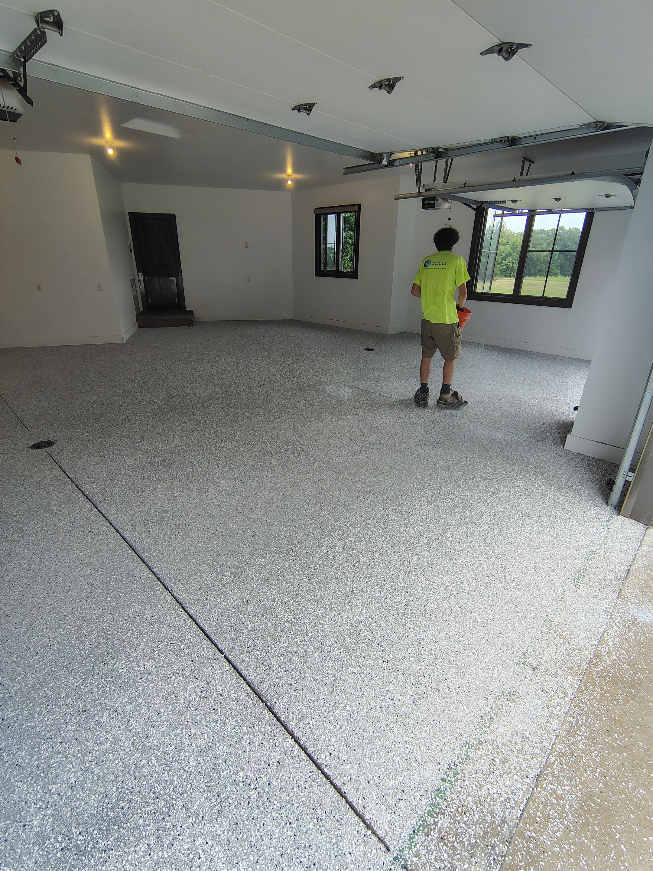 Feather Grey Floor Coating in Sioux Falls, SD by Select Painting, Coatings & Garage Cabinets
