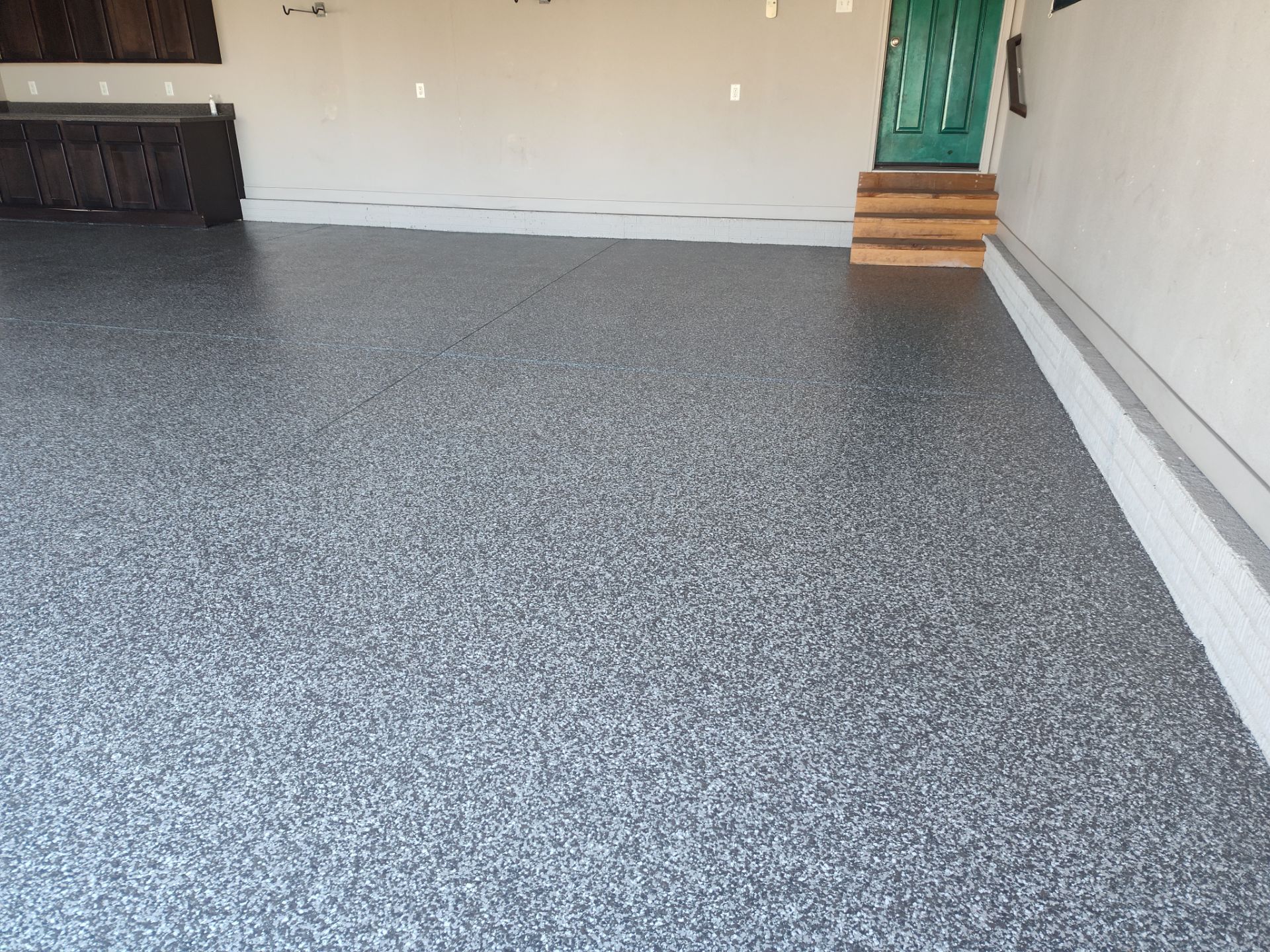 Another Garage Protected from Rock Salt & Chemicals by Revival Concrete Coatings, LLC