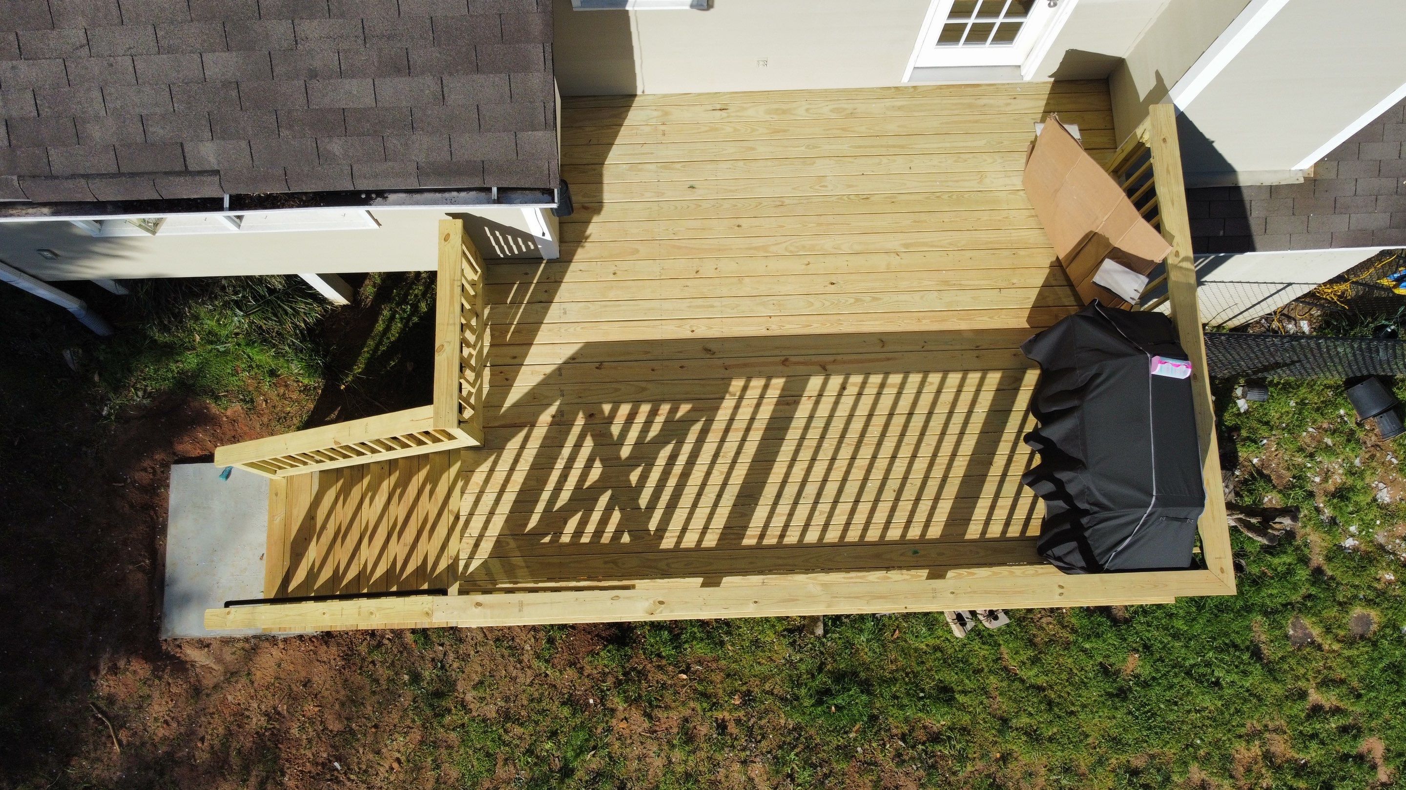 Elevated Pressure-Treated Wood Deck Replacement in Marietta by Swift Home Renovations