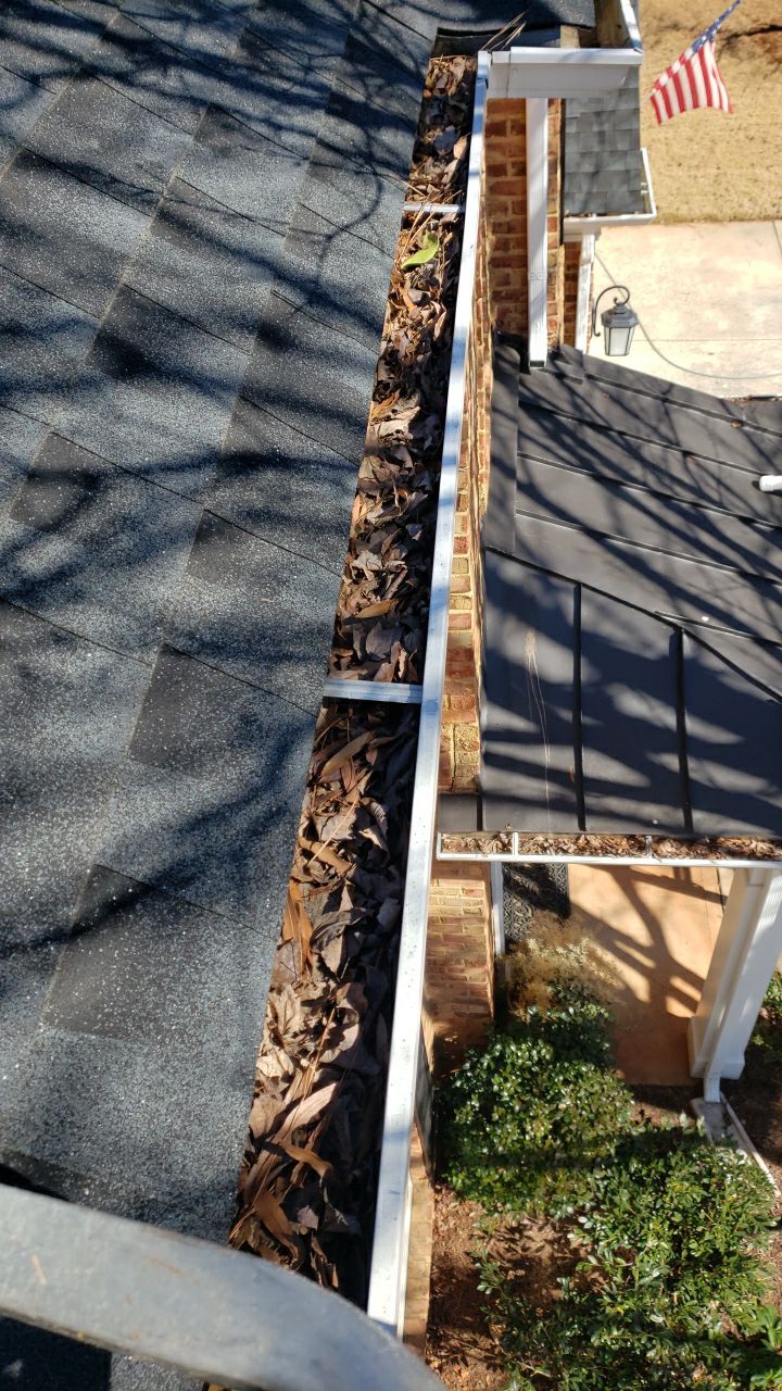 Gutter Cleaning using water by Power Wash Masters LLC
