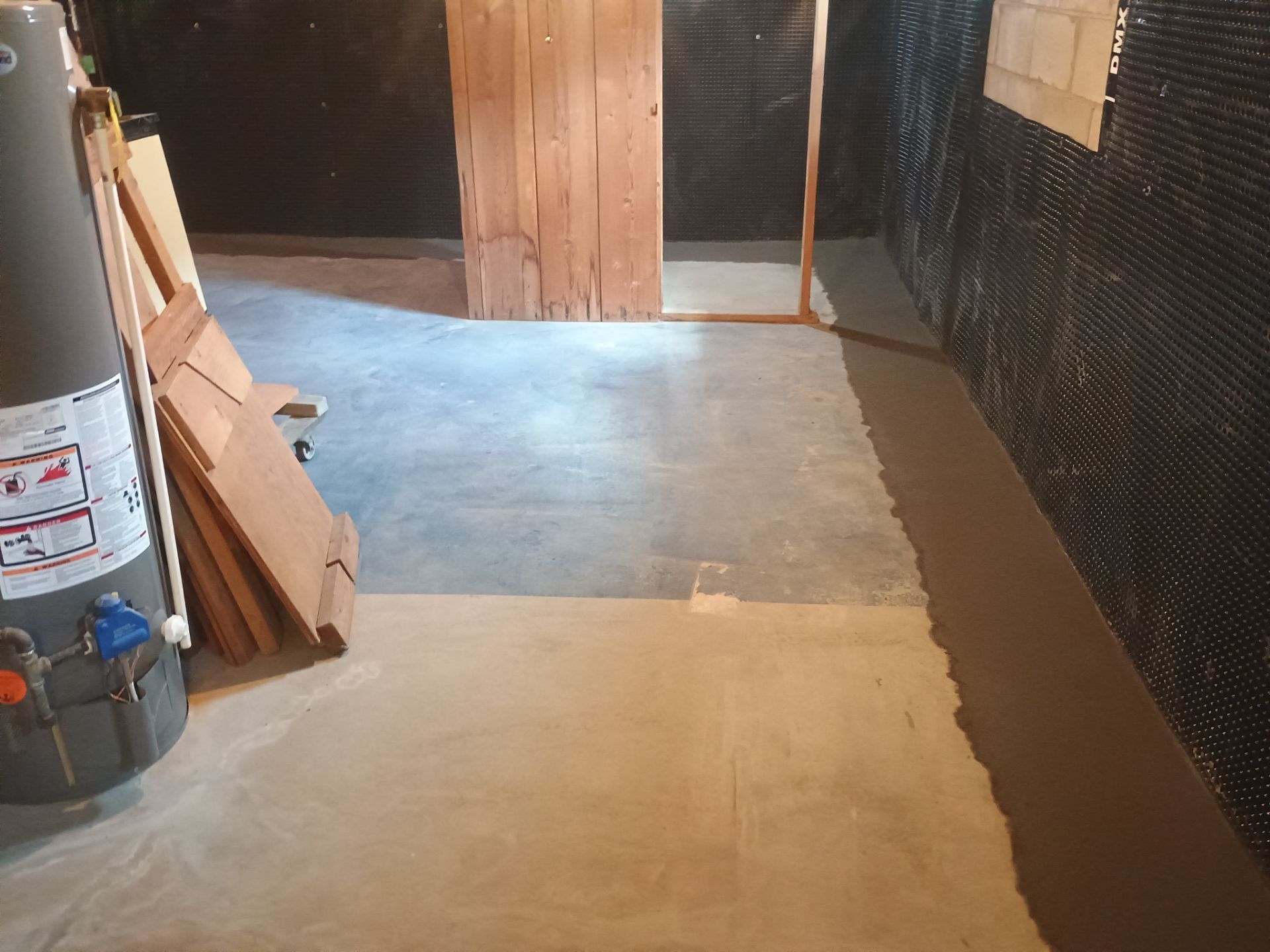 Interior Drain Tile & Buried Discharge in South Minneapolis by Waterproofing Northeast