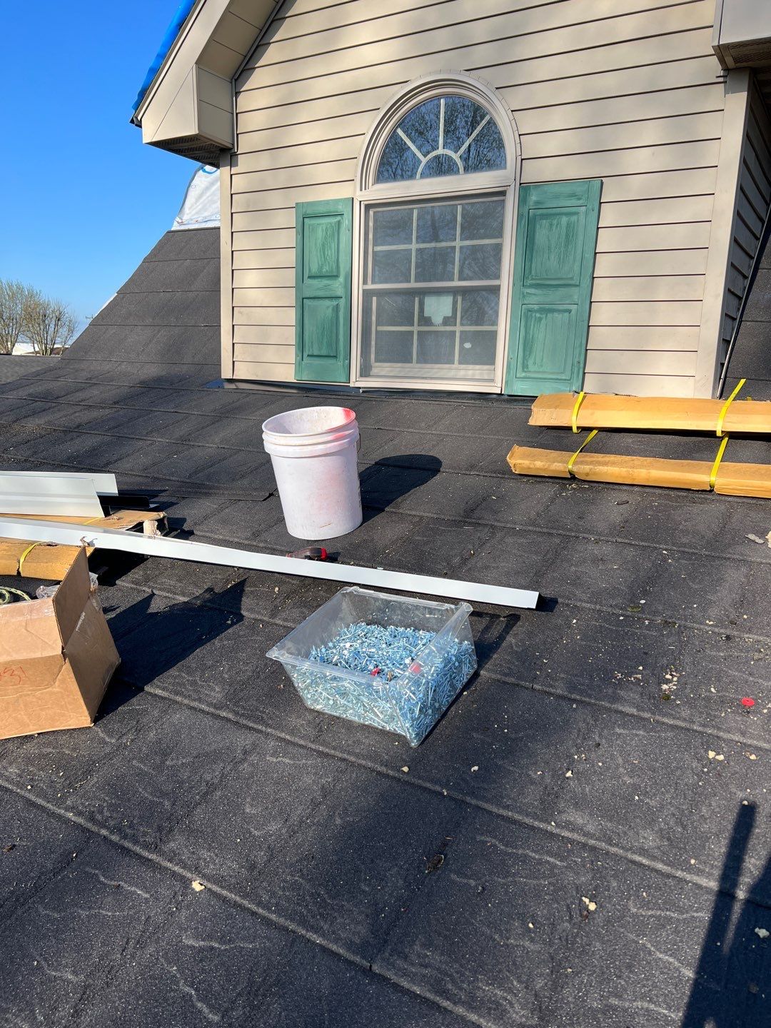 Residential Roofing Repair using Metstar Stone Coated Charcoal by Nitro Roofing and Construction