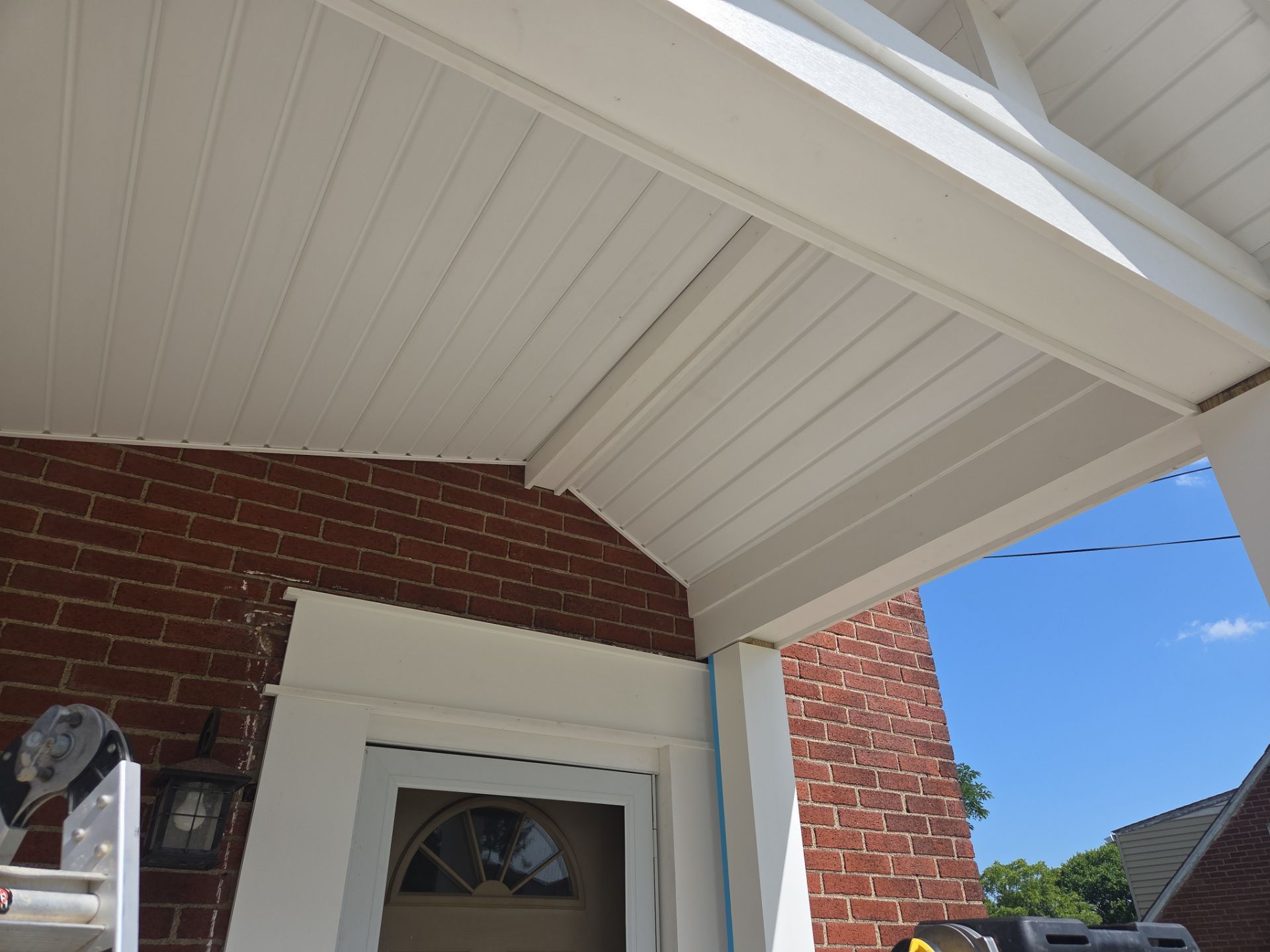 Concret and roof build  by Cousins Roofing Siding & Decks