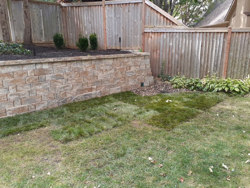 Back Yard Harington Retaining Wall by LAND ESCAPES LLC