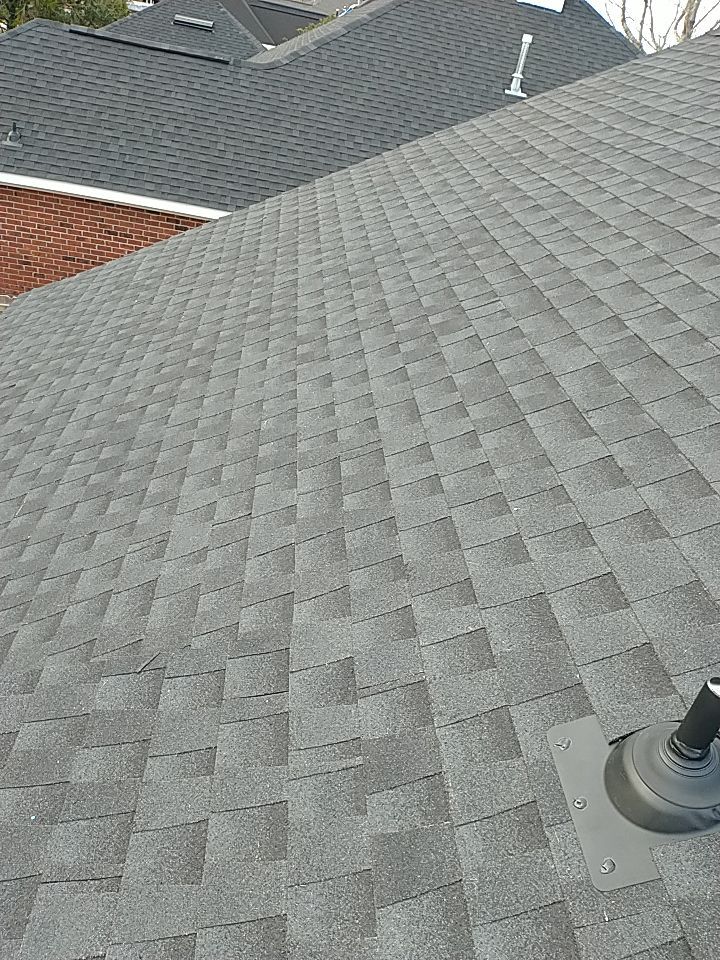 Residential Roofing Installation using Roof Replacement by American Roofing & Construction LLC