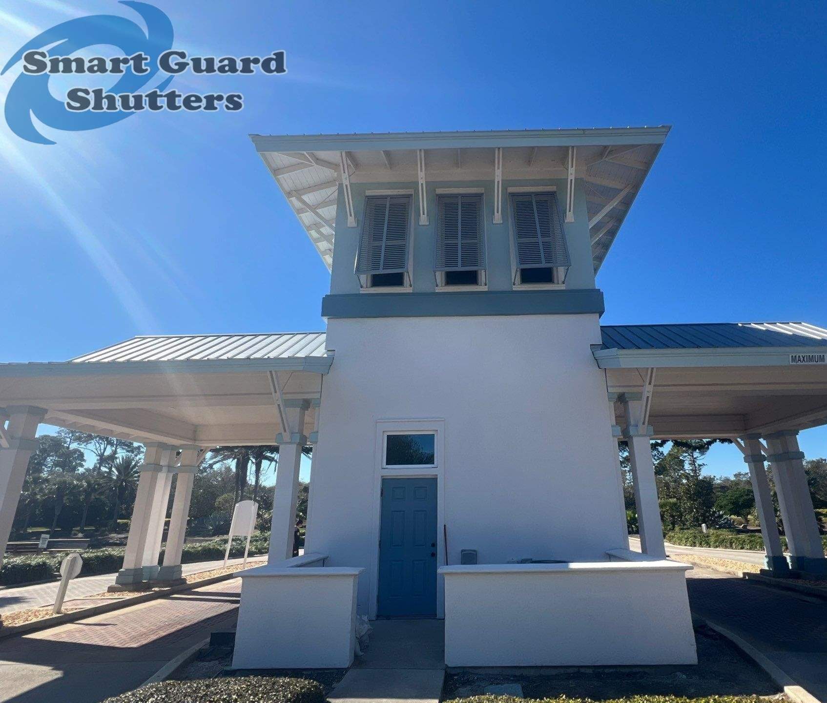 Decorative Bahama Shutters in Window Grey by Smart Guard Shutters