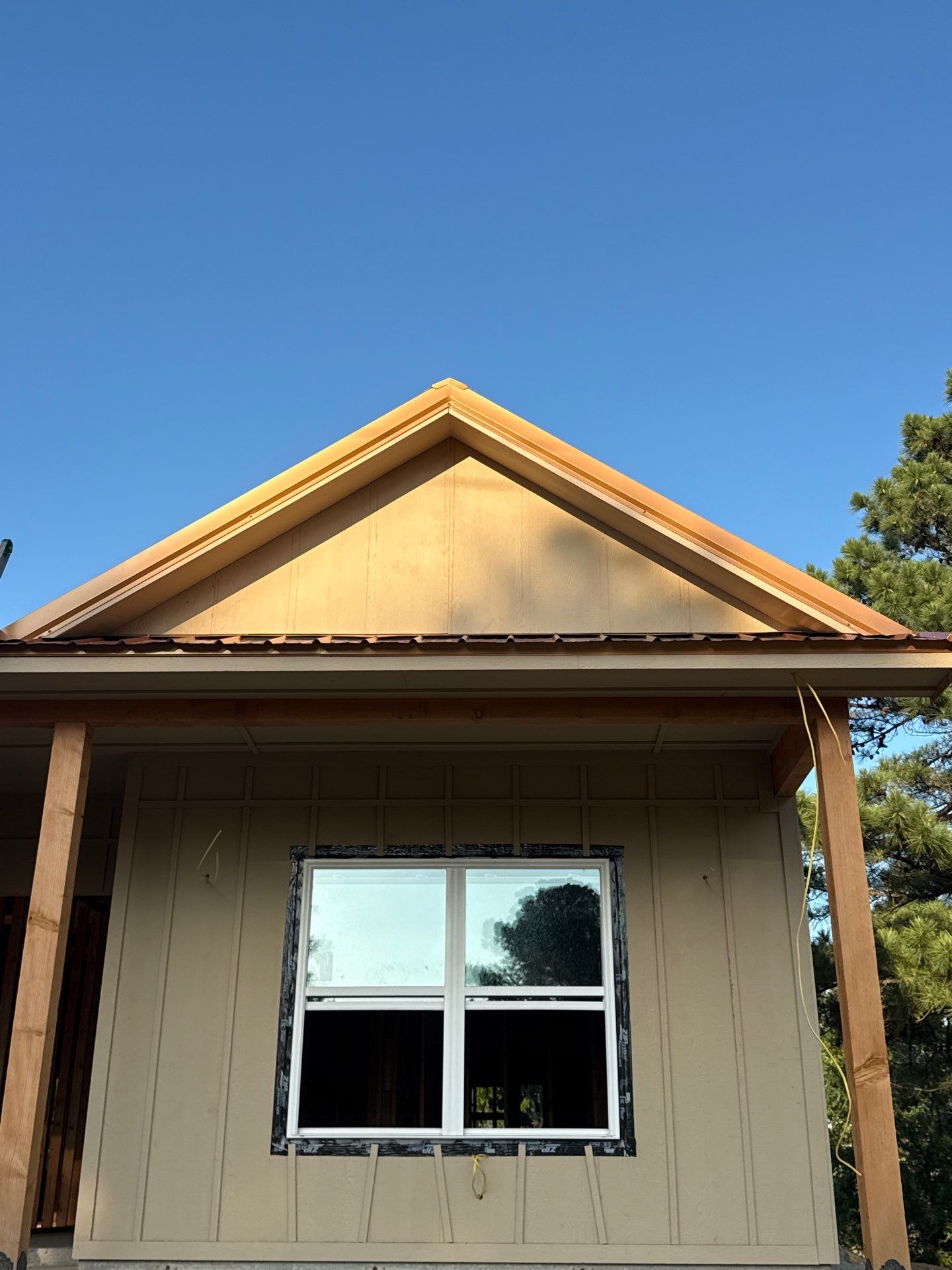 Copper Metallic 26-gauge low rib metal roofing. by In & Out Construction & Remodeling, LLC