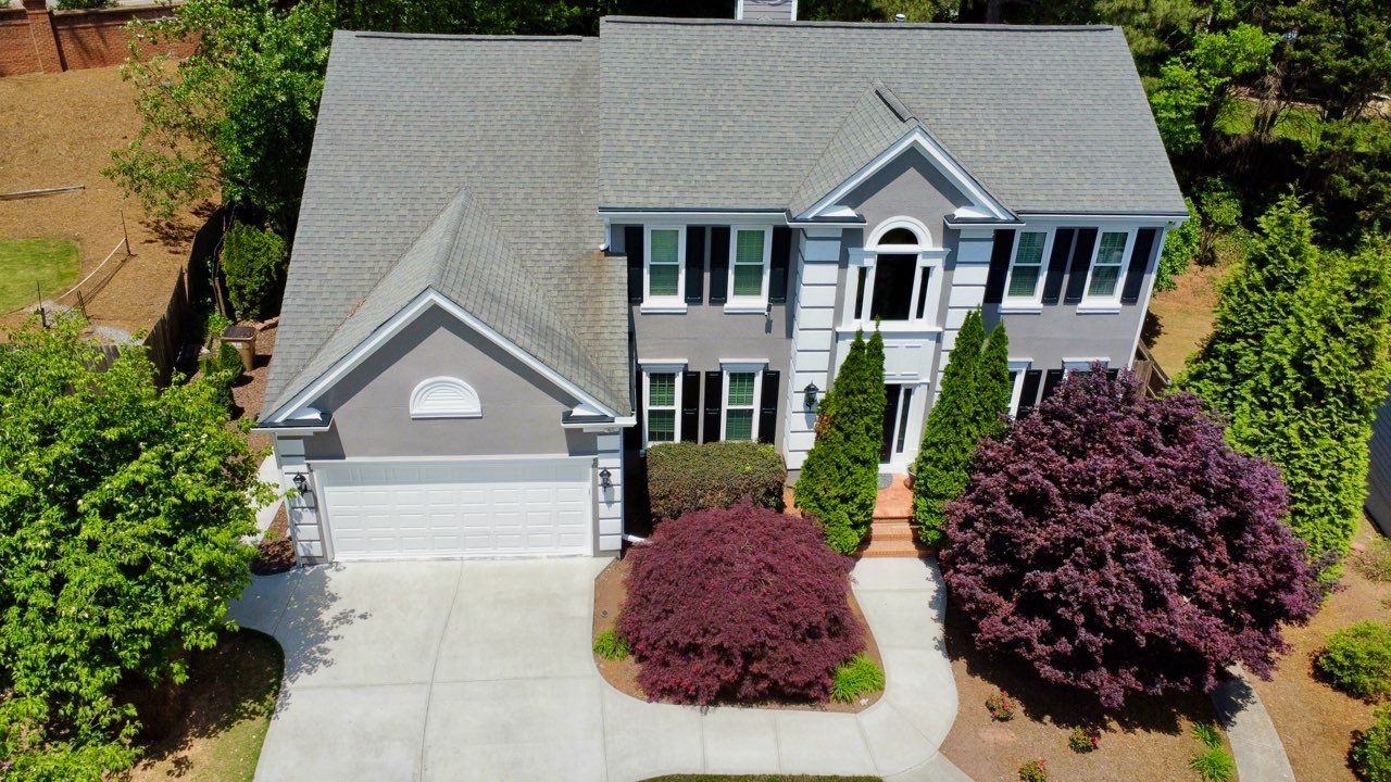 Full Exterior Siding Replacement and Custom Deck in Johns Creek by Swift Home Renovations 