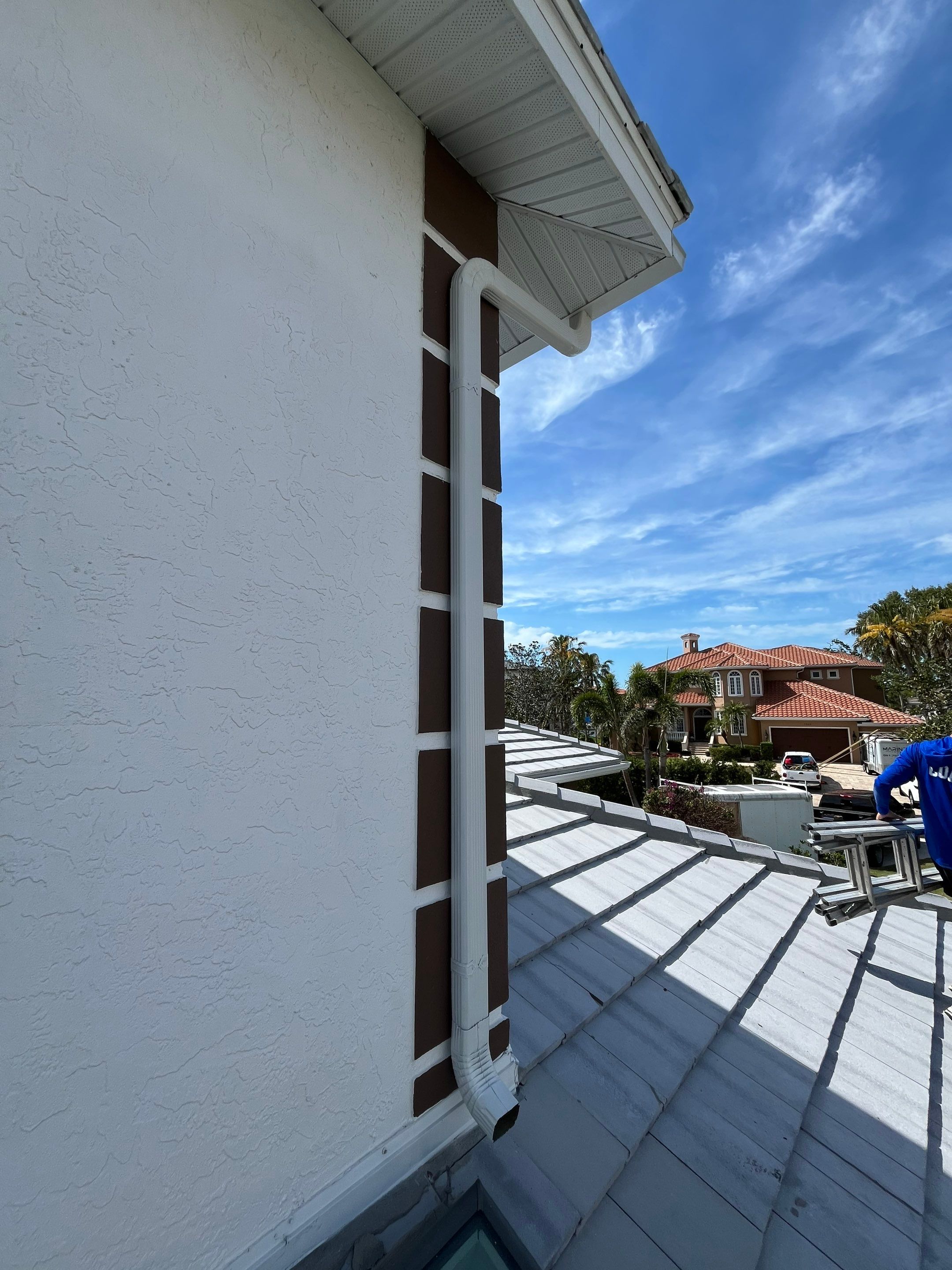 Repainting and Upgrading Gutters in Sarasota FL by Gutter Professors