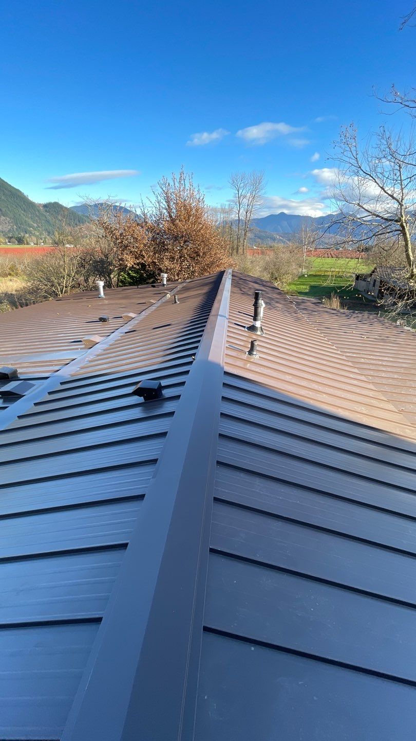 Residential Roofing Installation using 12" Prolok metal  by Top Notch Roofing Inc