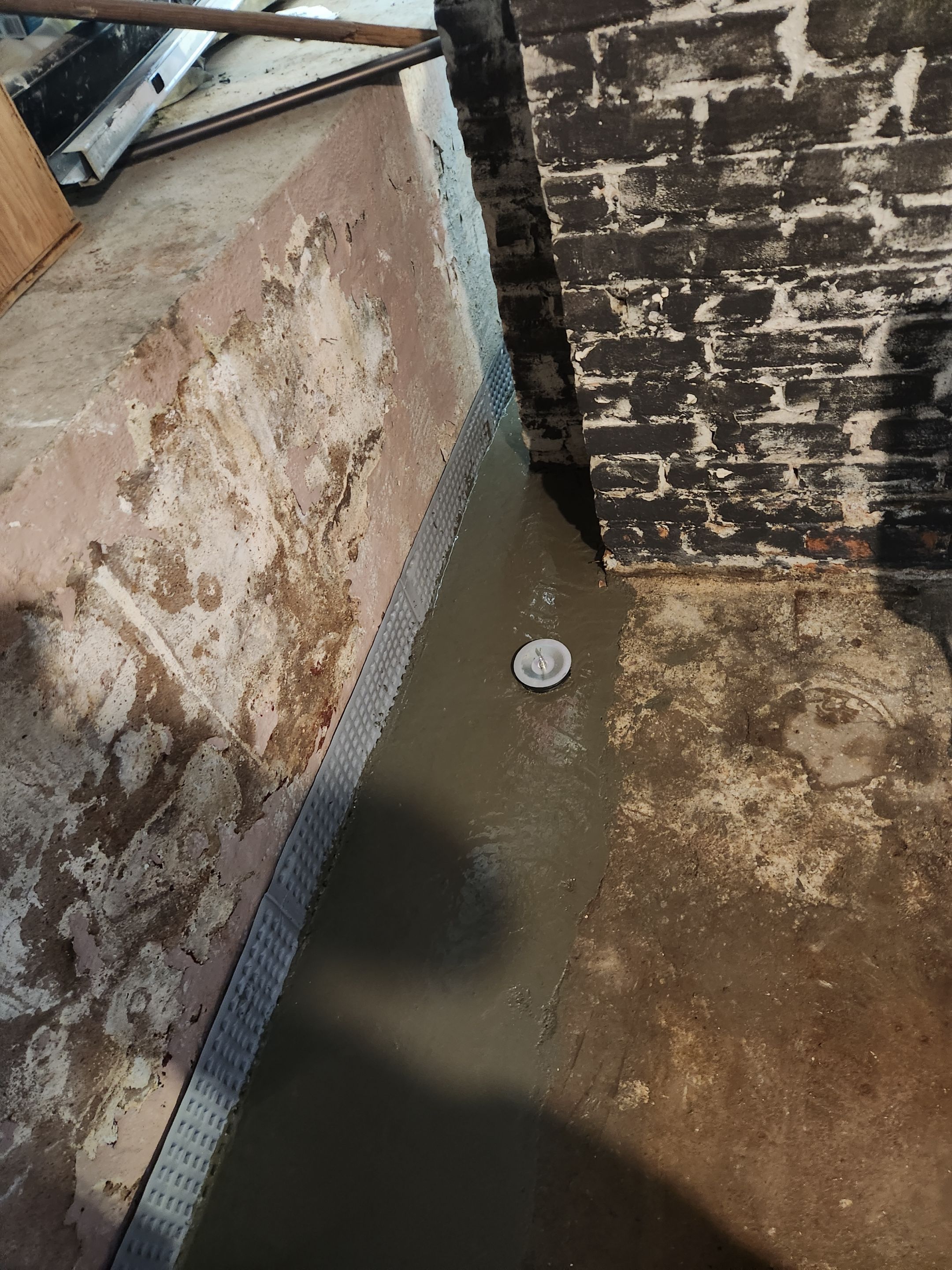 Interior French Drain East Orange NJ by Pure Service Pro, LLC 