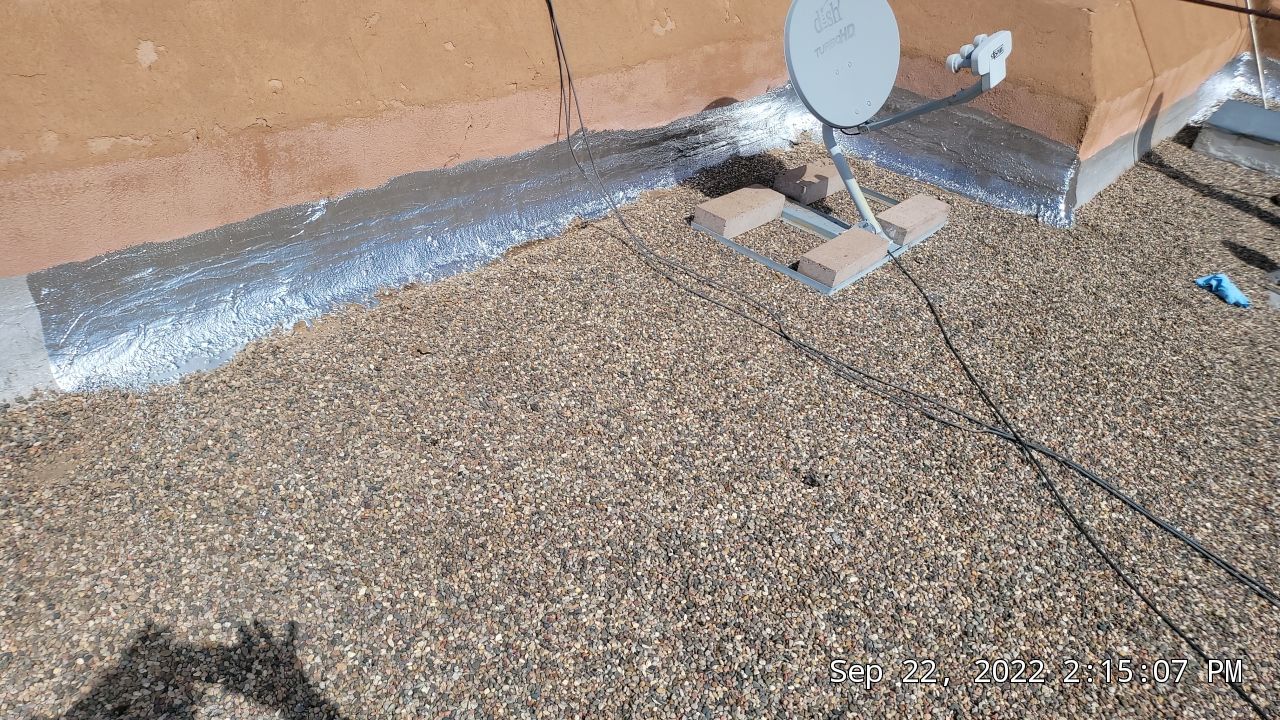 Roof Maintenance and Low-E Tempered Glass Skylight Replacement on Gravel Roof in Northwest Albuquerque by Doyle Roof Masters Inc
