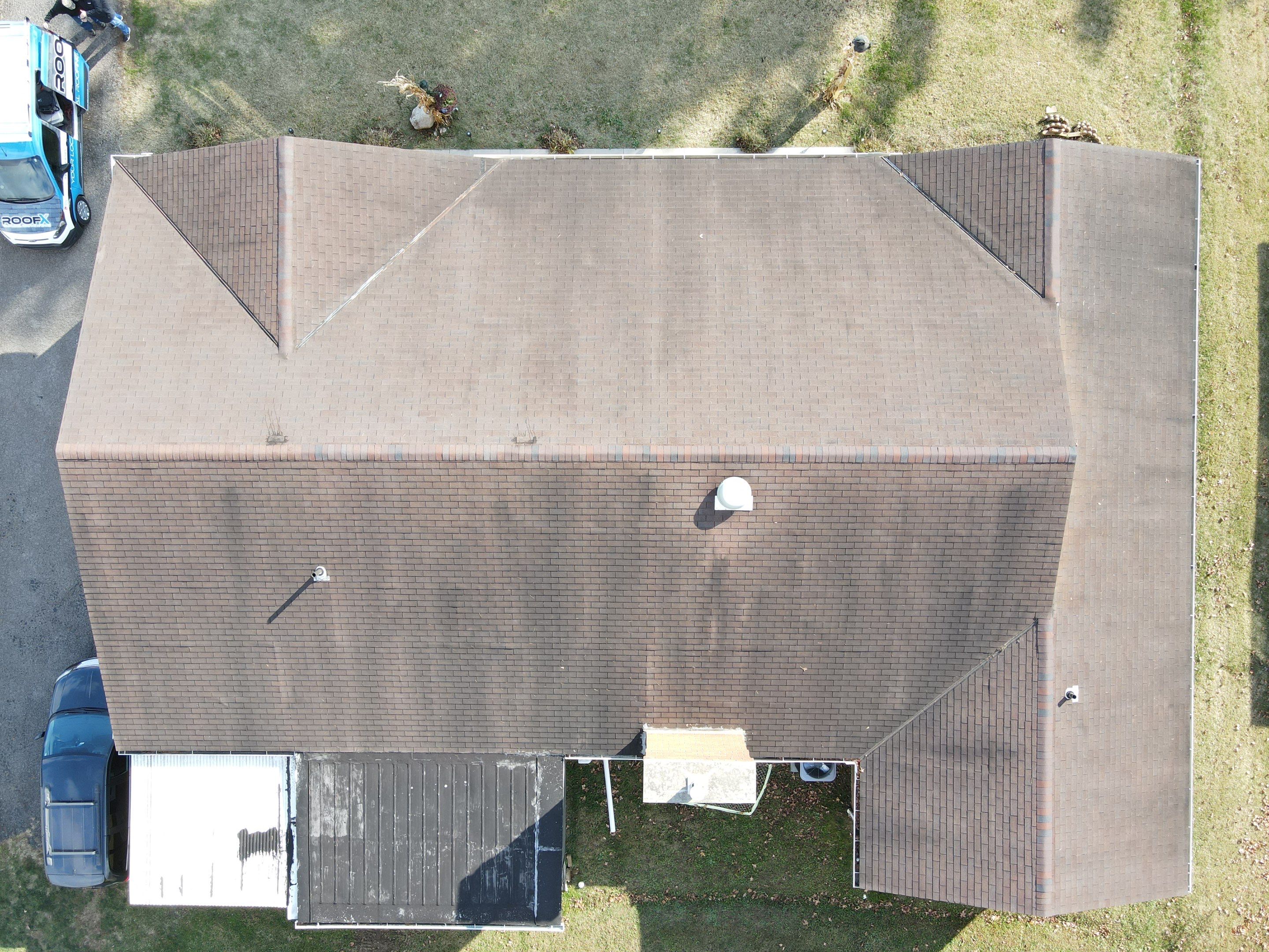Residential Roofing Installation using Perfromance Panel Metal - Black by RoofX 