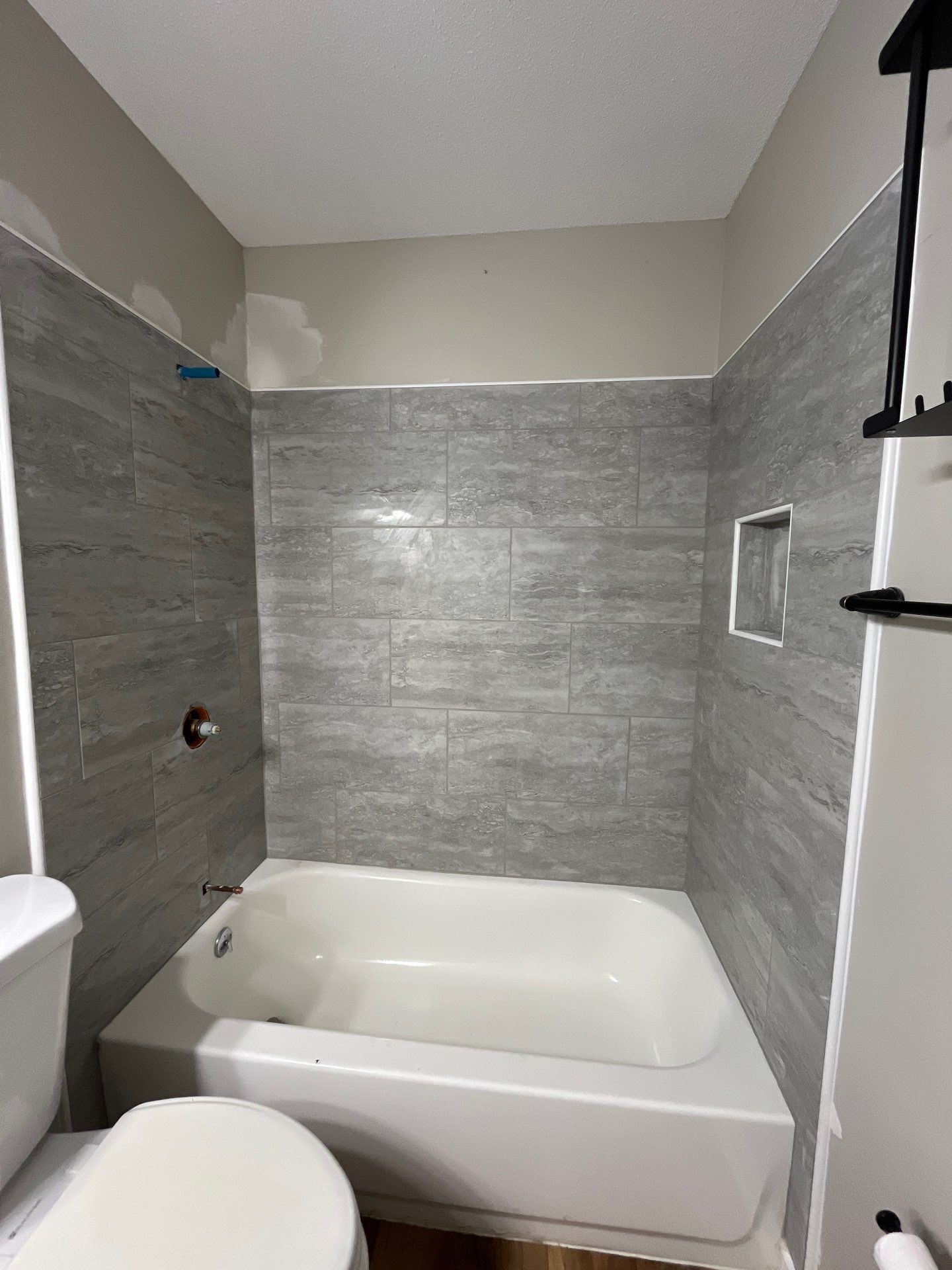Herman's Shower Remodel  by Skilled Construction LLC
