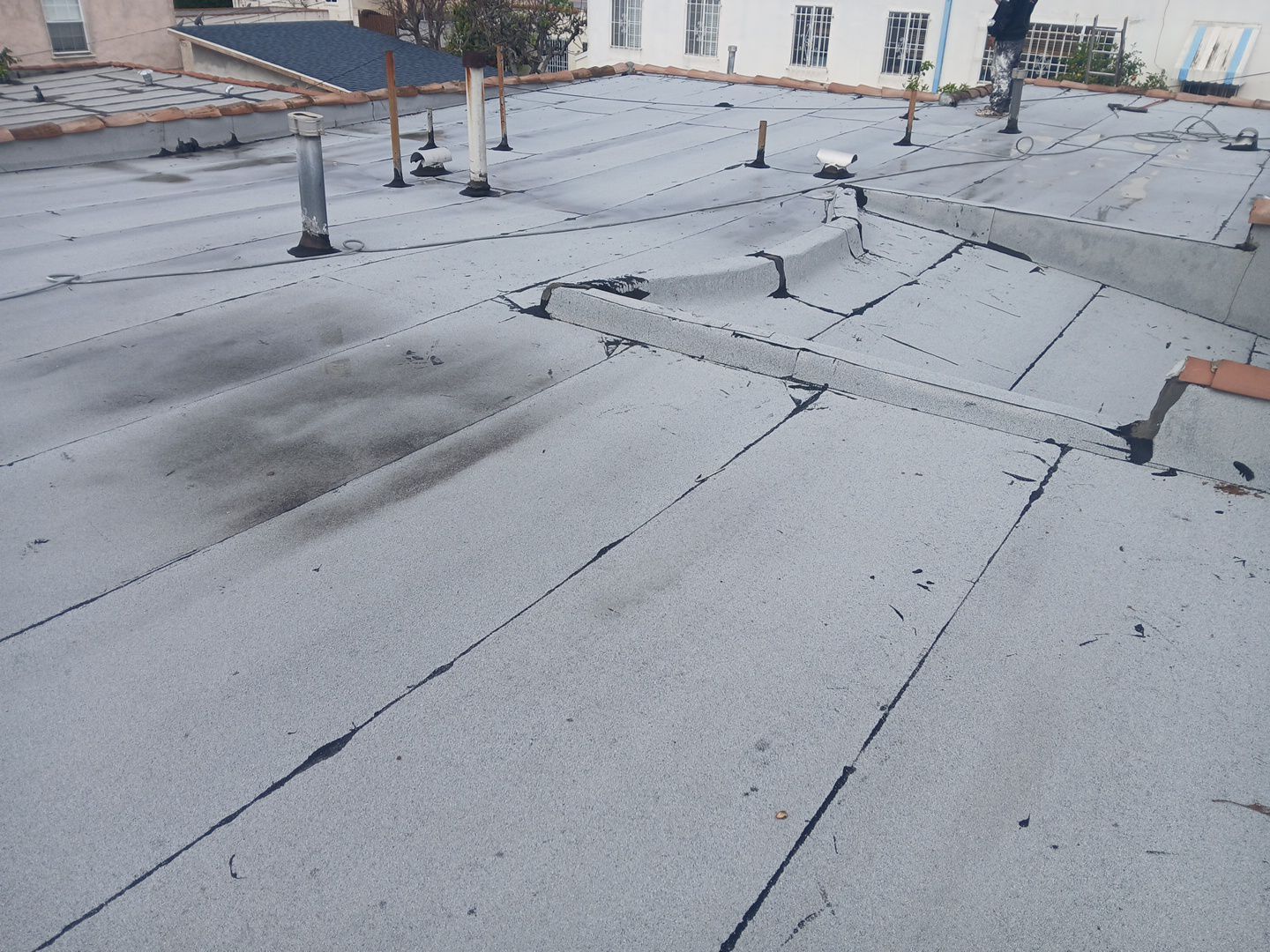 Silicone Membrane Installation using American Standard Coatings Silicone-S by Hull Brothers Roofing