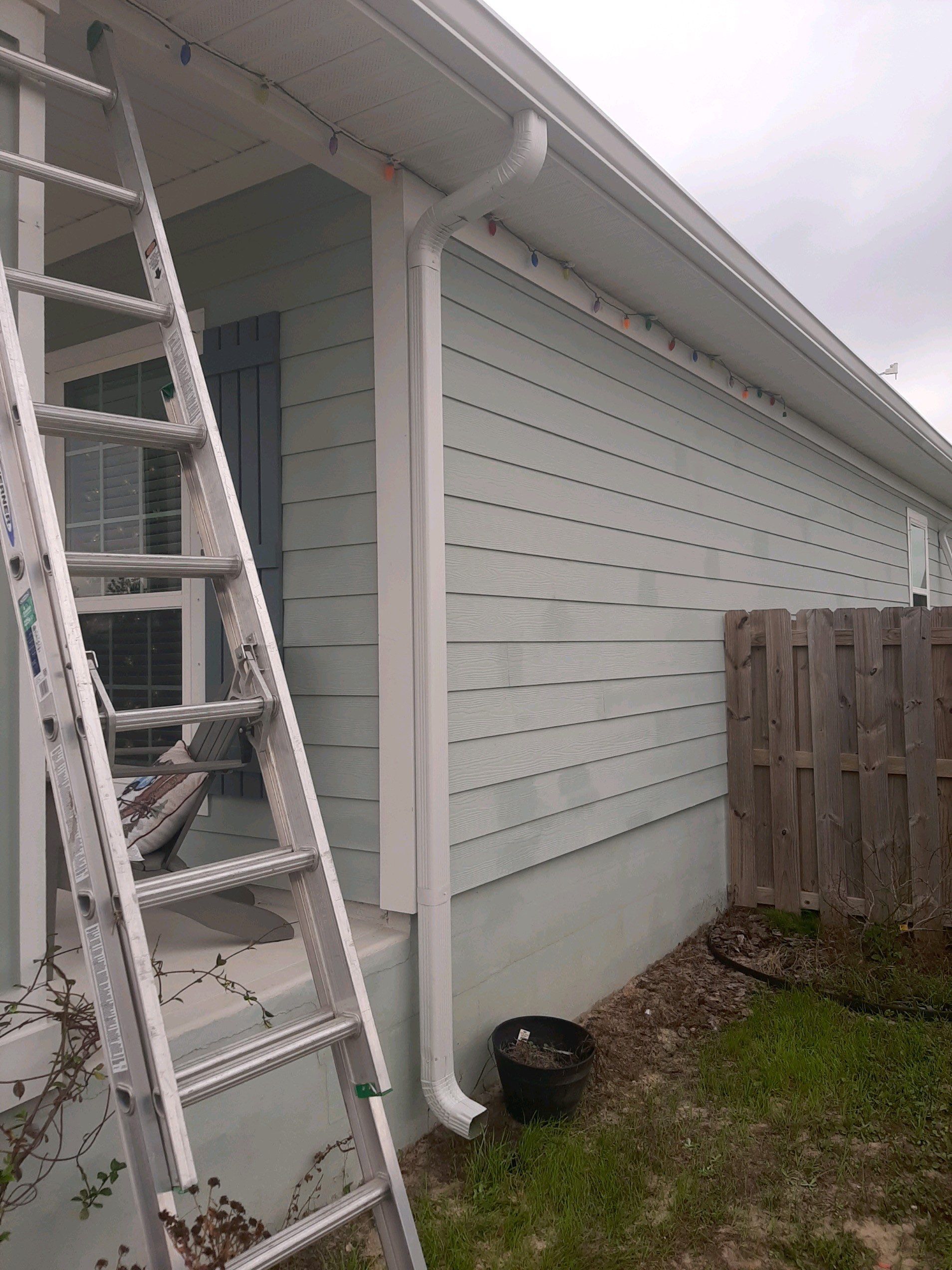 Gutter Installation Using White K-Style Seamless Gutters by Gutter Professors