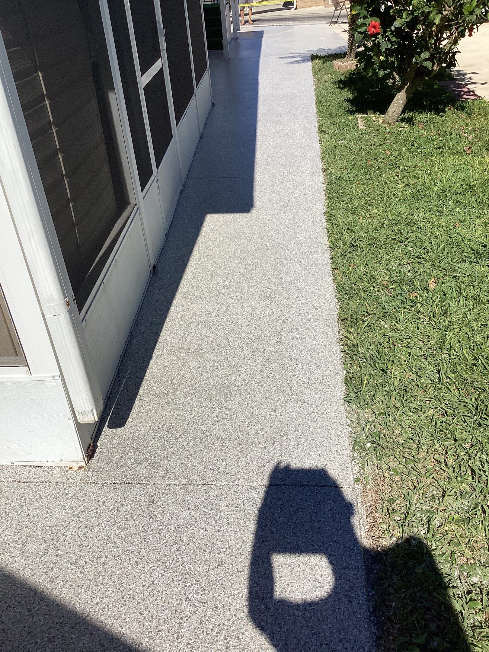 Driveway using Mt Everest by Amvet concrete coatings llc