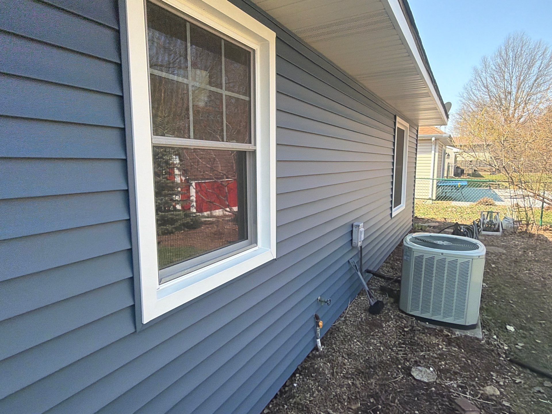 Siding and gutters replacement by Optimal Home Improvement 