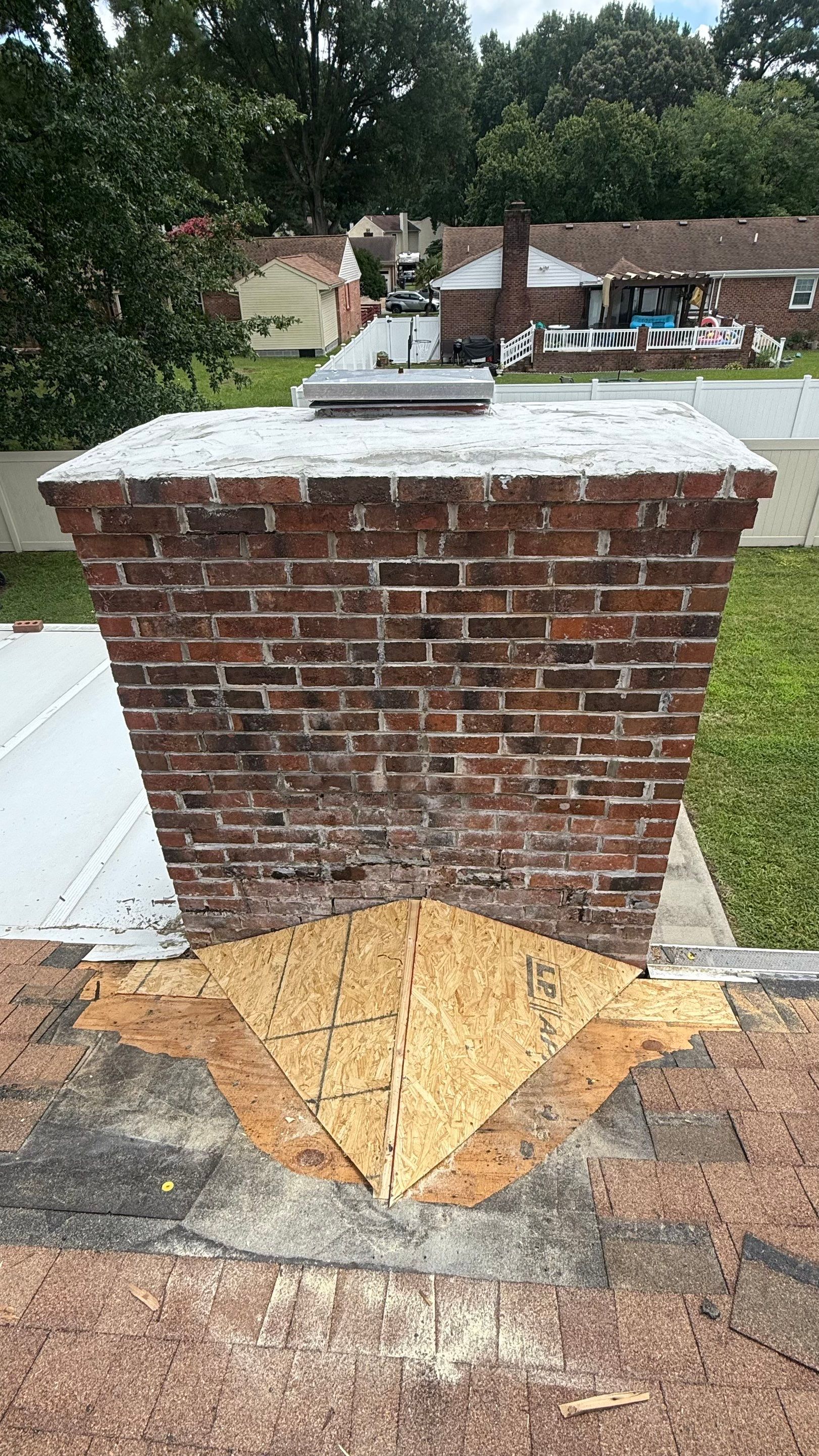 Chimney Relining, Masonry Repair, and Flashing Replacement in Chesapeake, VA by Premier Chimney and Roofing