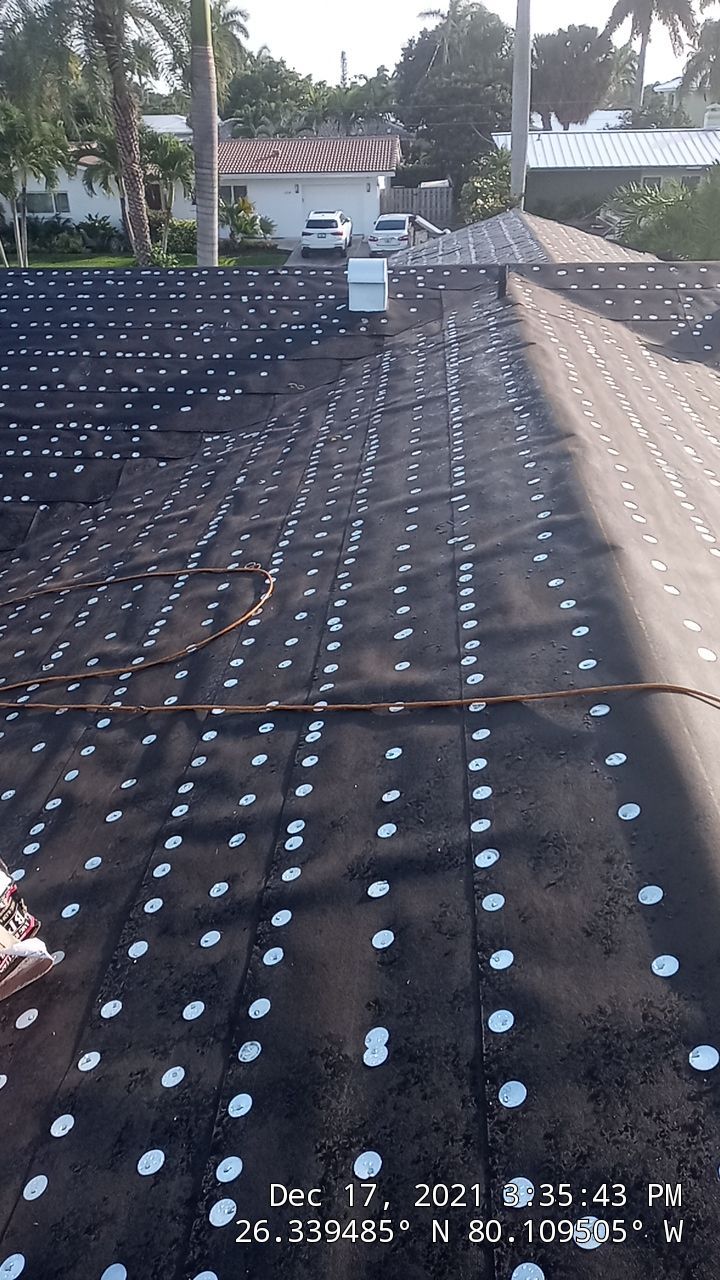 Residential Roofing Installation using 1" Nail strip metal roof by BLUES BROTHERS ROOFING