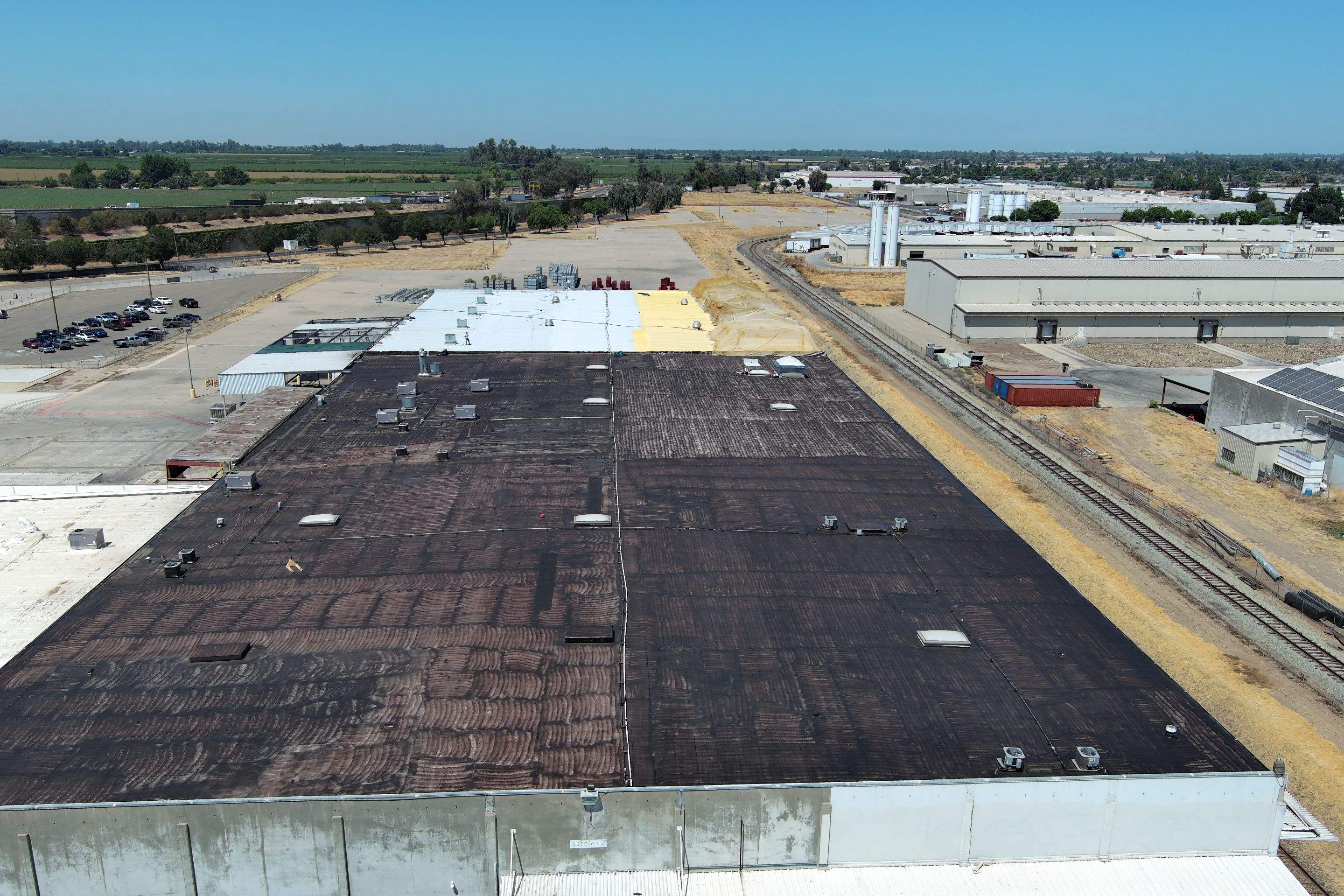 Pro Farms Spray foam roofing project by Straight Edge Roofing Inc
