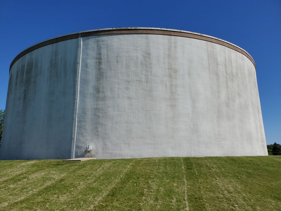 Water tank cleaning by Northern Power Washing LLC.