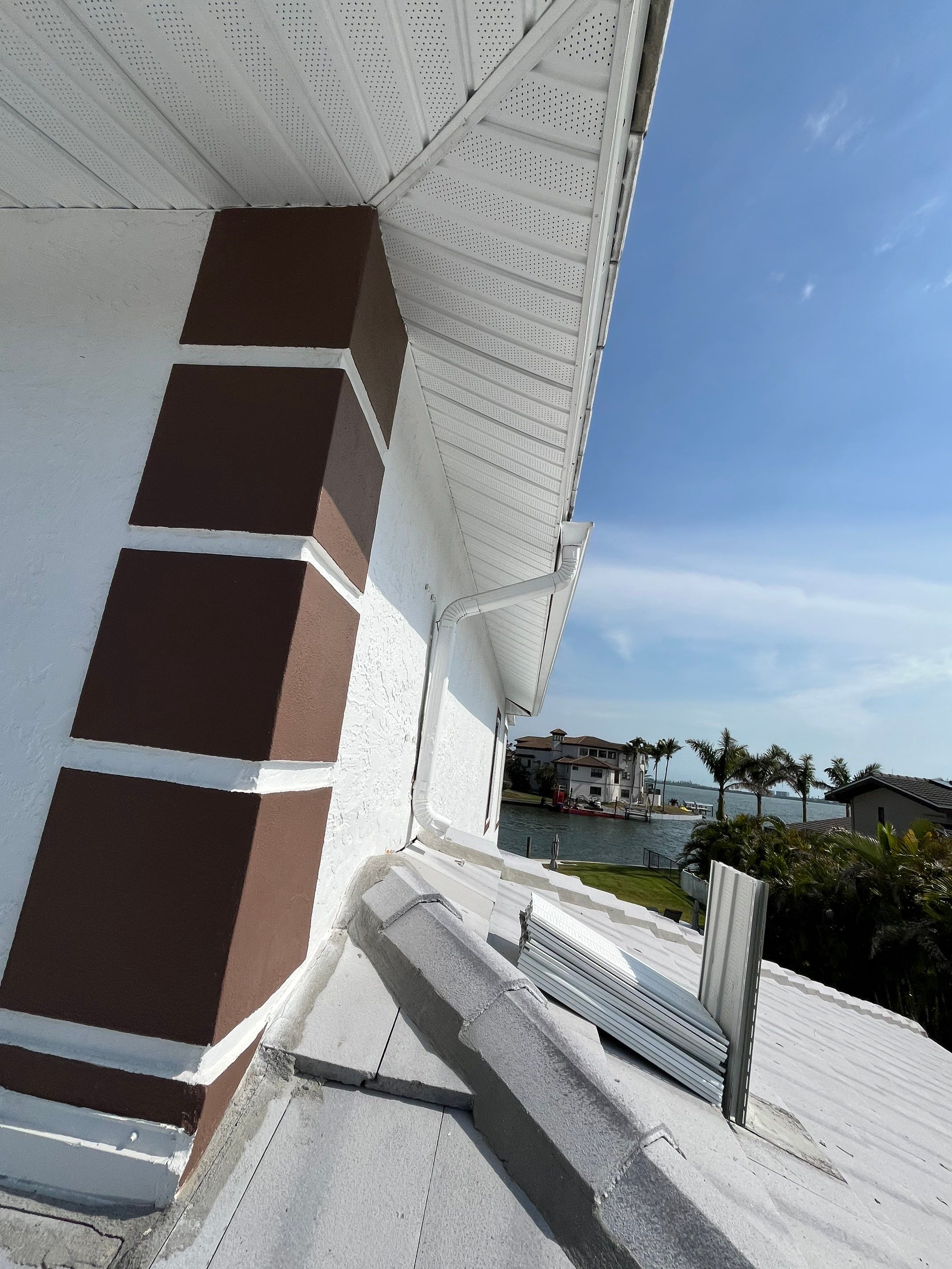 Repainting and Upgrading Gutters in Sarasota FL by Gutter Professors