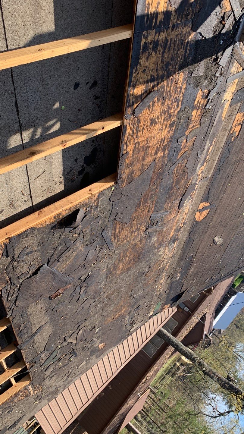 Residential Roofing Installation using 29 Gauge Colored Metal by Hostetler Roofing