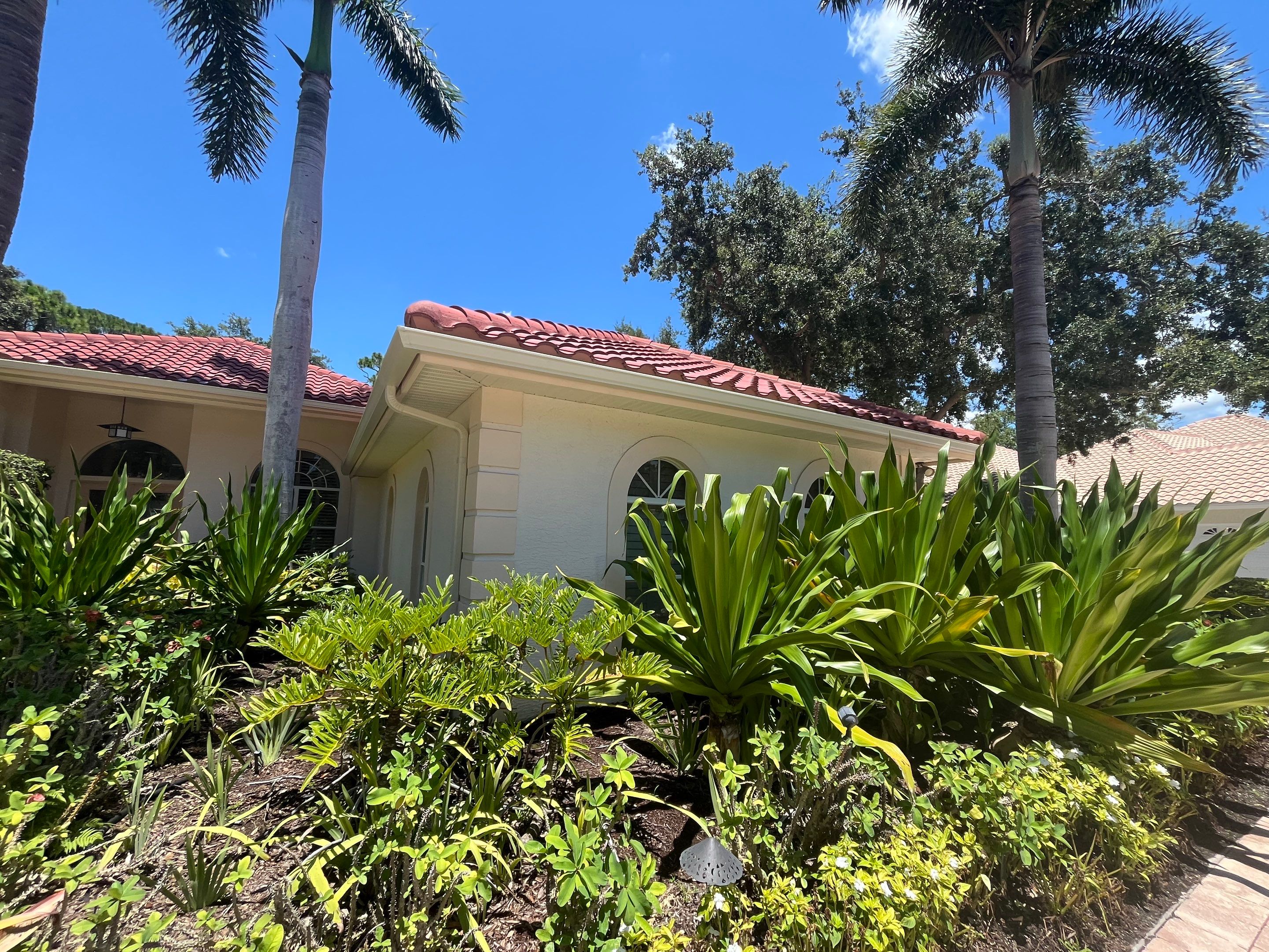 Splash Guard Gutters for Rainy Season Protection in Osprey FL by Gutter Professors