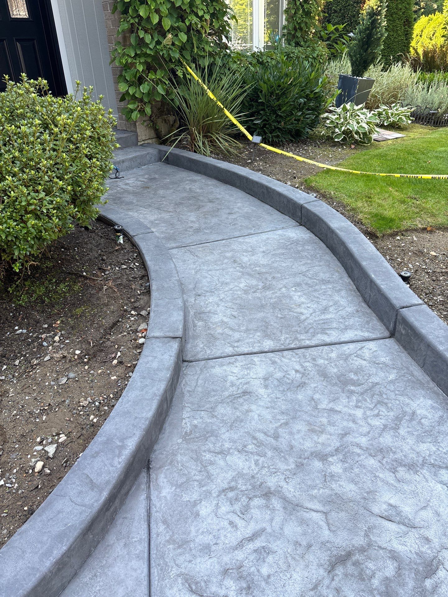 Multi-color Stamped & Sealed Concrete Driveway Renovation | Mukilteo by Jireh Asphalt & Concrete Inc