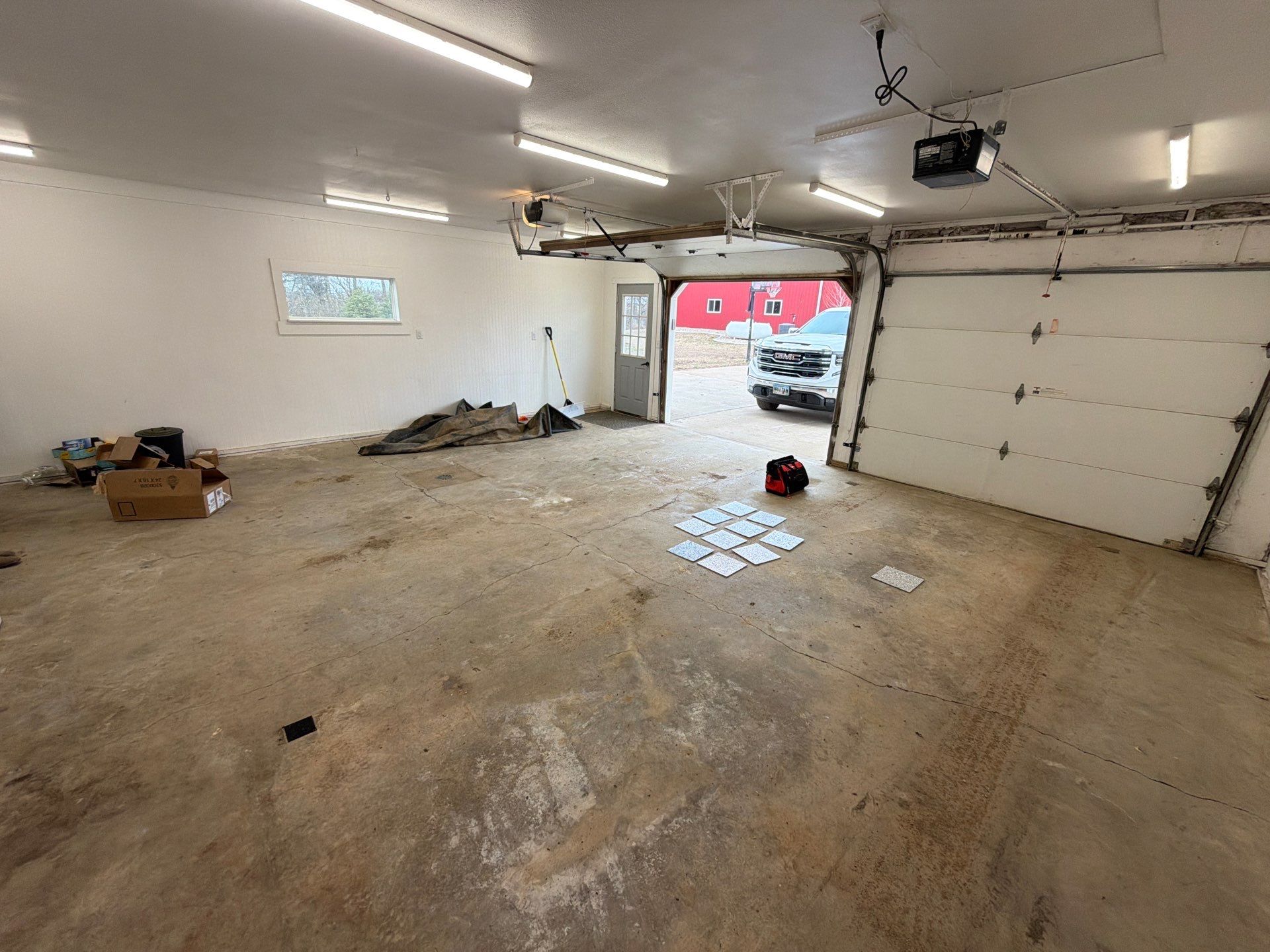 Feather Grey Garage Floor Coating and Crack Repair in Beresford by Select Painting, Coatings & Garage Cabinets