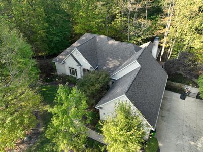 The Teak Standard: Flawless Wooster Roof Upgrade