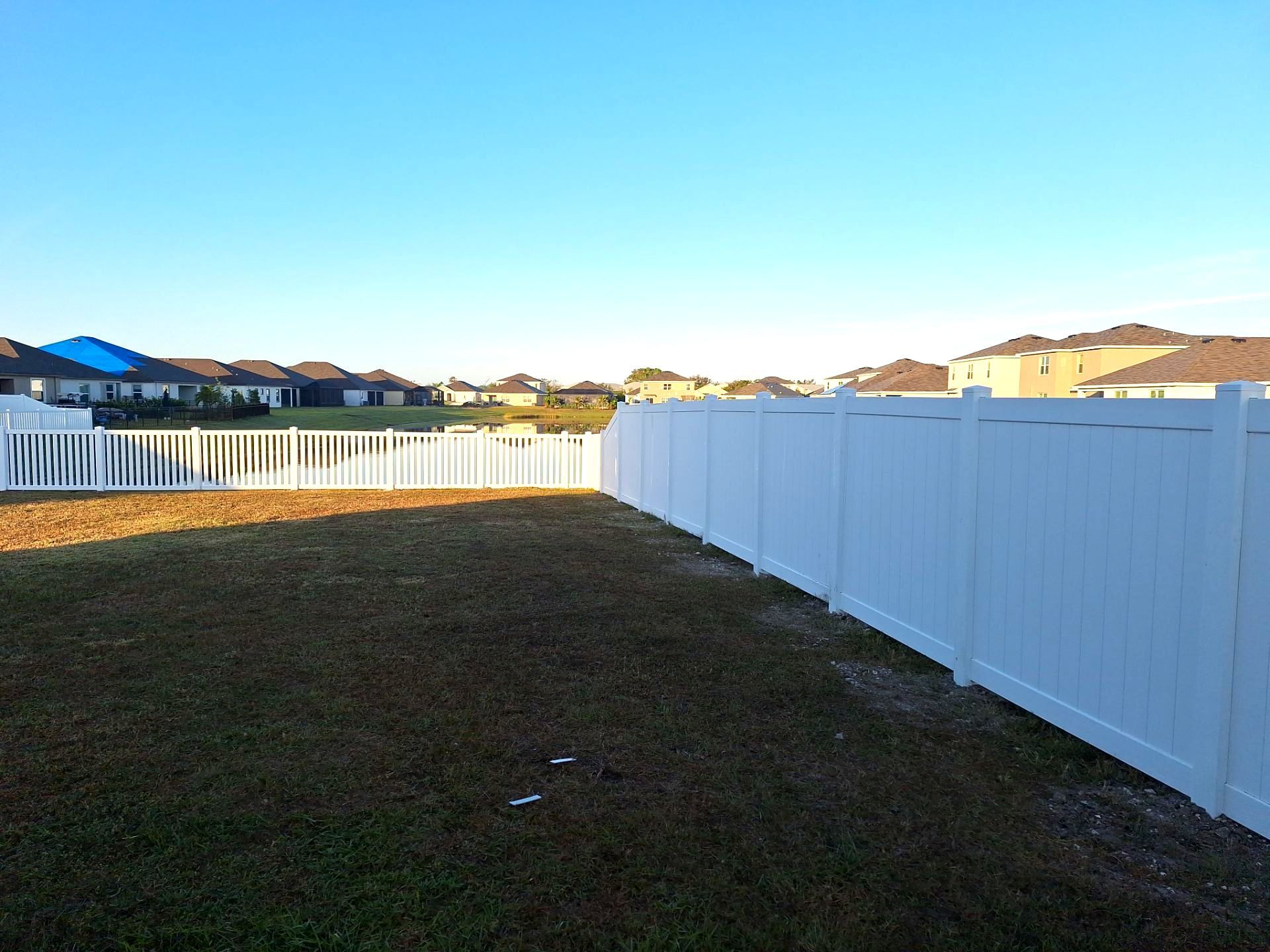 Vinyl Fence Installation using 6Ft White Vinyl Privacy Fence with a 4Ft White Clearwater Picket Fence by Asap fence and gates, LLC