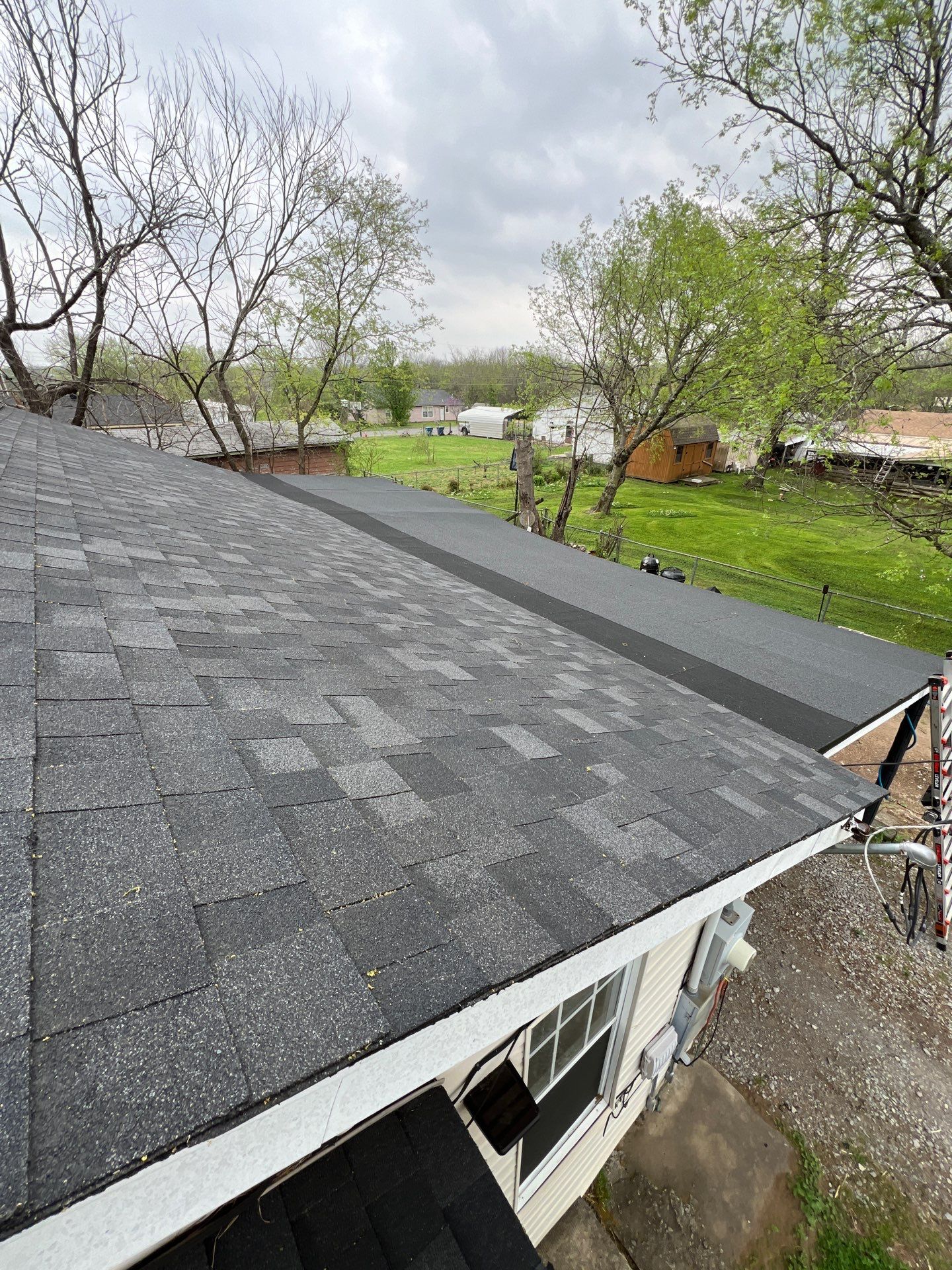 New Roof & Decking Brought to Code. by In & Out Construction & Remodeling, LLC