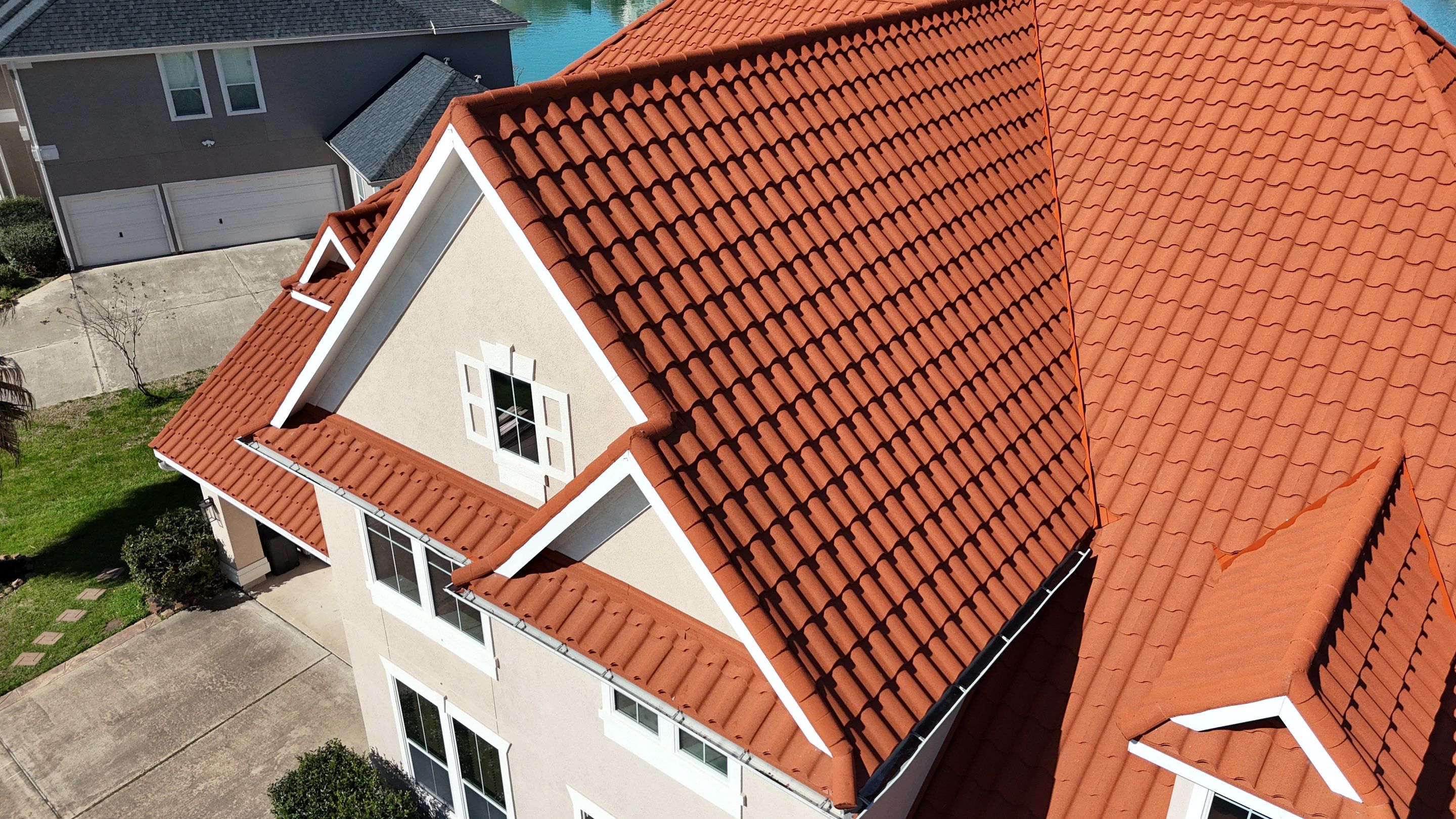 Stunning transformation using DECRA Villa Tile!  by Core Four Roofing