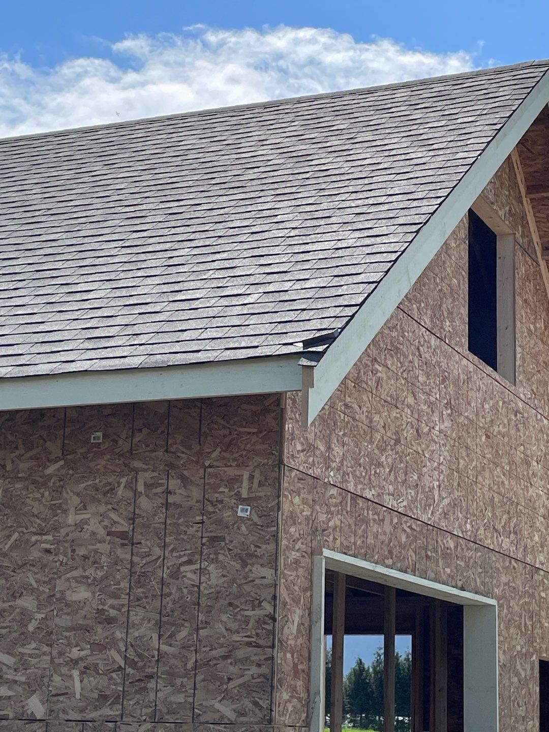 Residential Roofing Installation using IKO Weatherwood shingle by Top Notch Roofing Inc