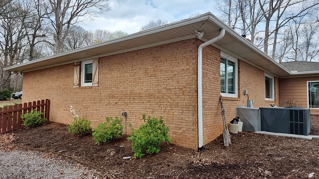 House Wash using cleaner by Power Wash Masters LLC
