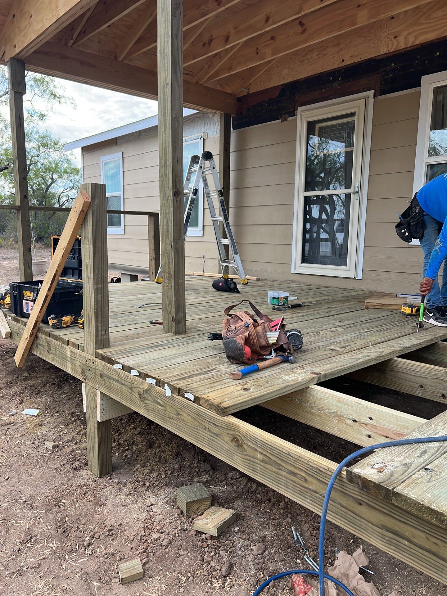 Front Porch Sitt'n by Bayfront Roofing and Construction