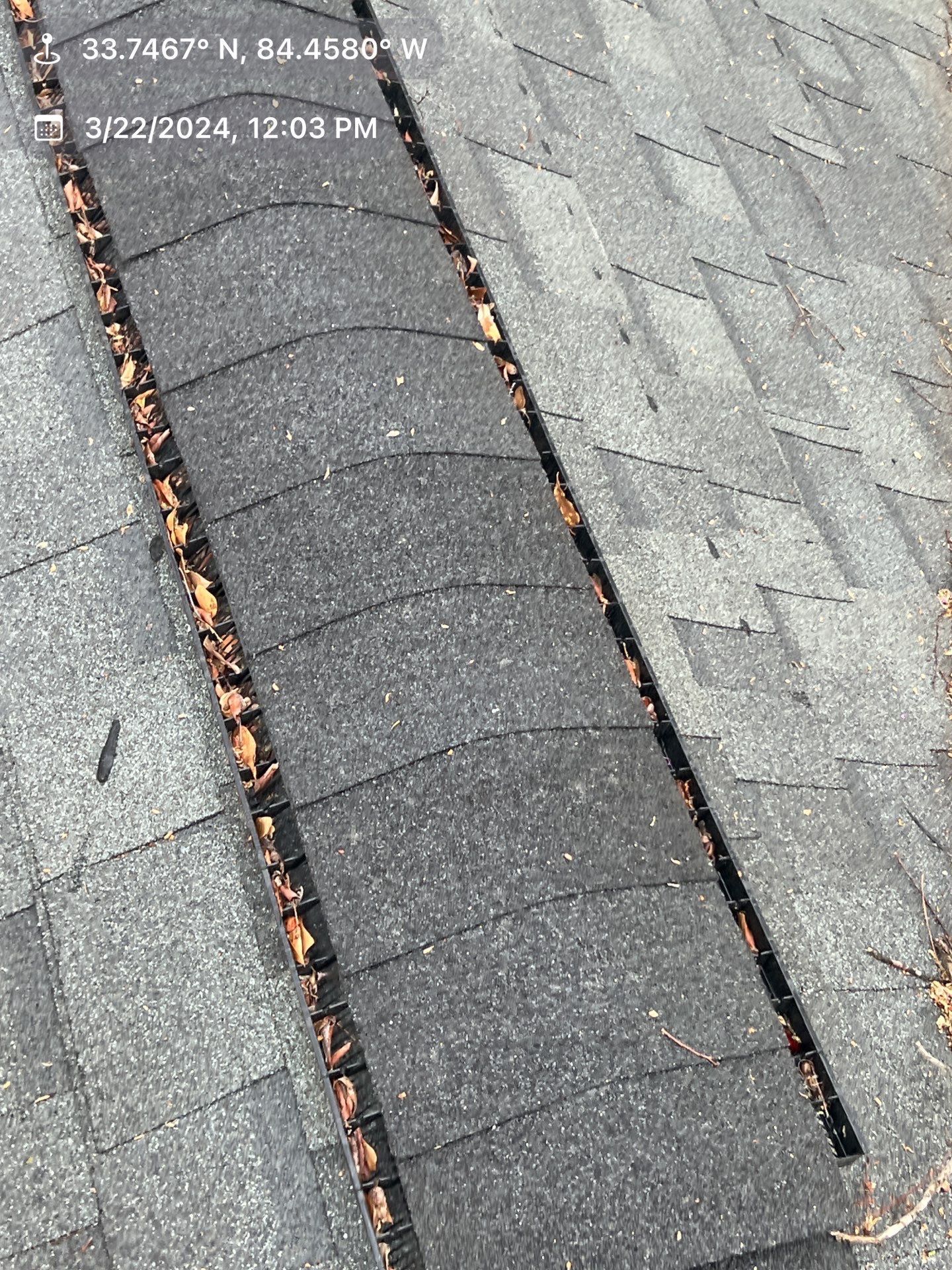 Gutter Cleaning using brown bags by Roof Bullies