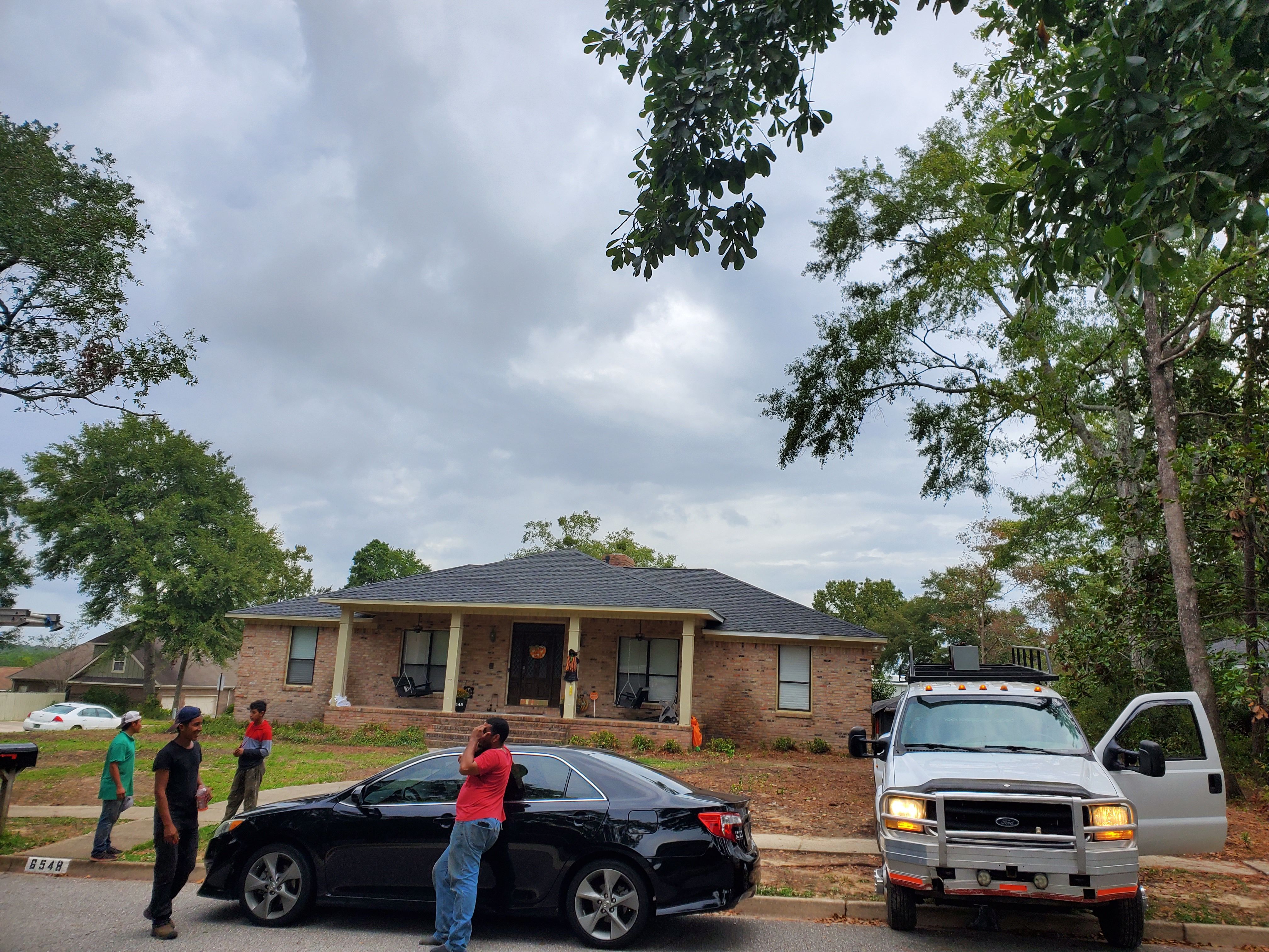 Residential Roofing Installation using Roof Replacement by American Roofing & Construction LLC
