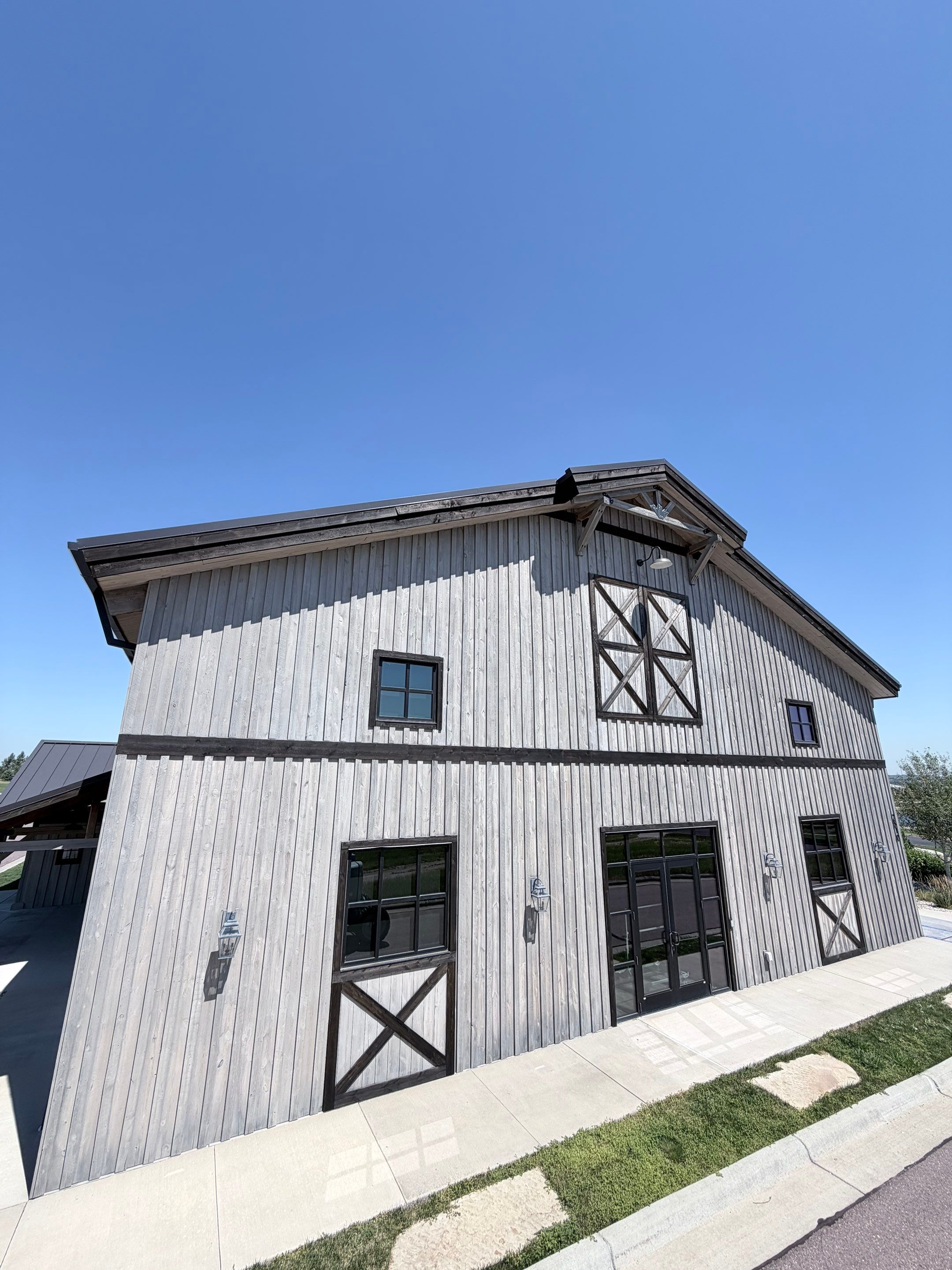 Commercial Exterior Wood Staining for Sanford Barn in Sioux Falls by Select Painting, Coatings & Garage Cabinets