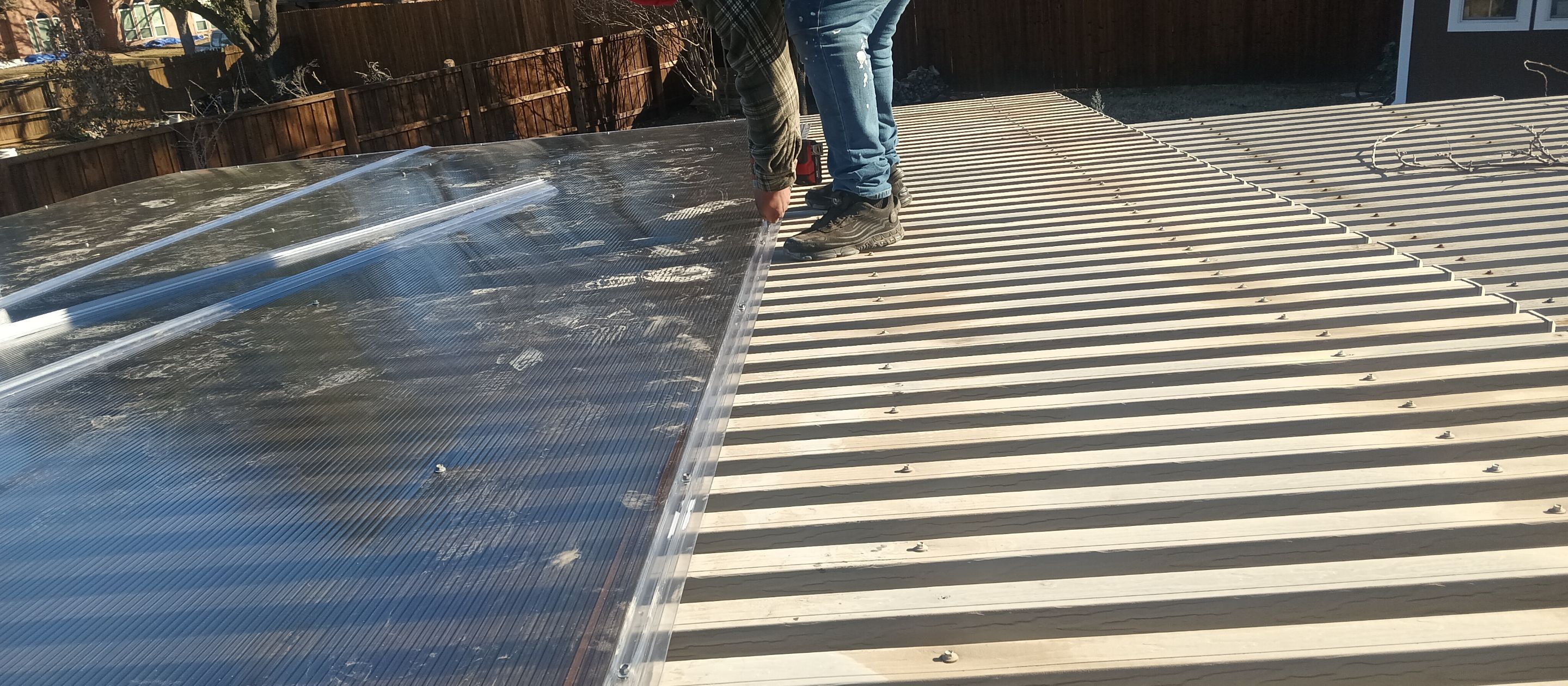 Polygal twin wall roofing system using 8mm bronze twin wall polygal by Grizzly Fence And Patio