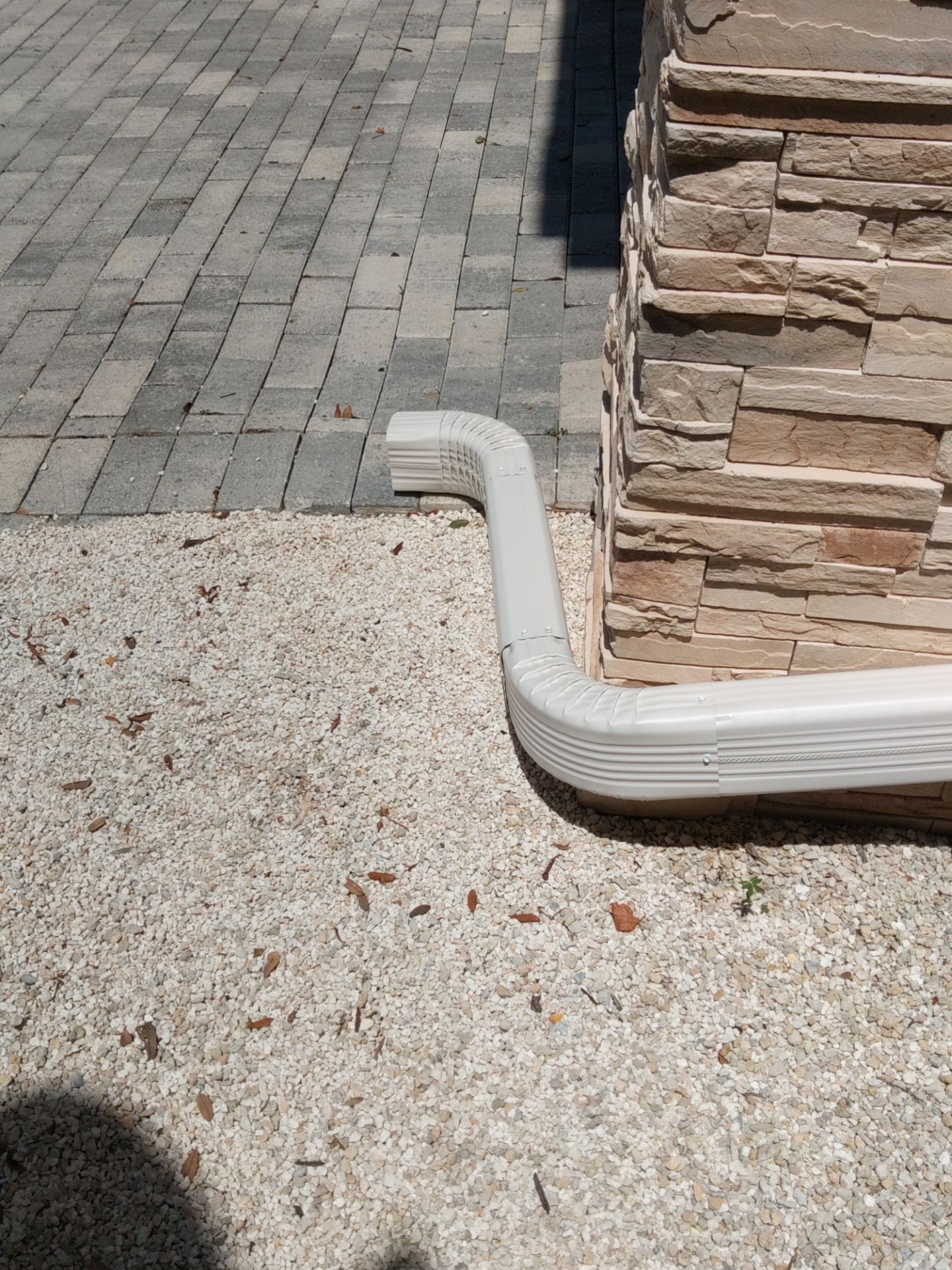 Bronze Gutters and Almond Downspouts in Longboat Key FL by Gutter Professors