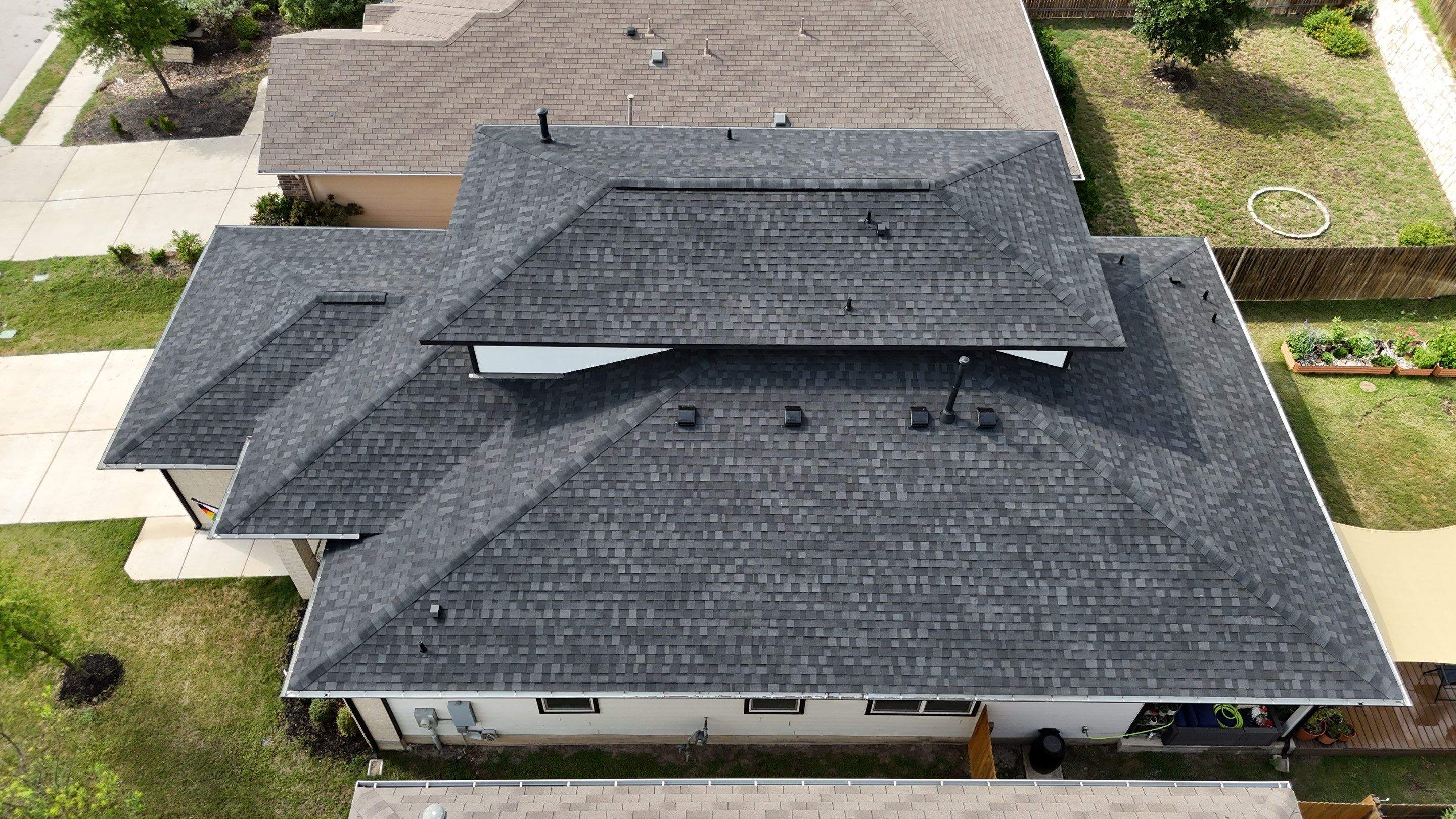Granite Black Shingles by Perennial Roofing 