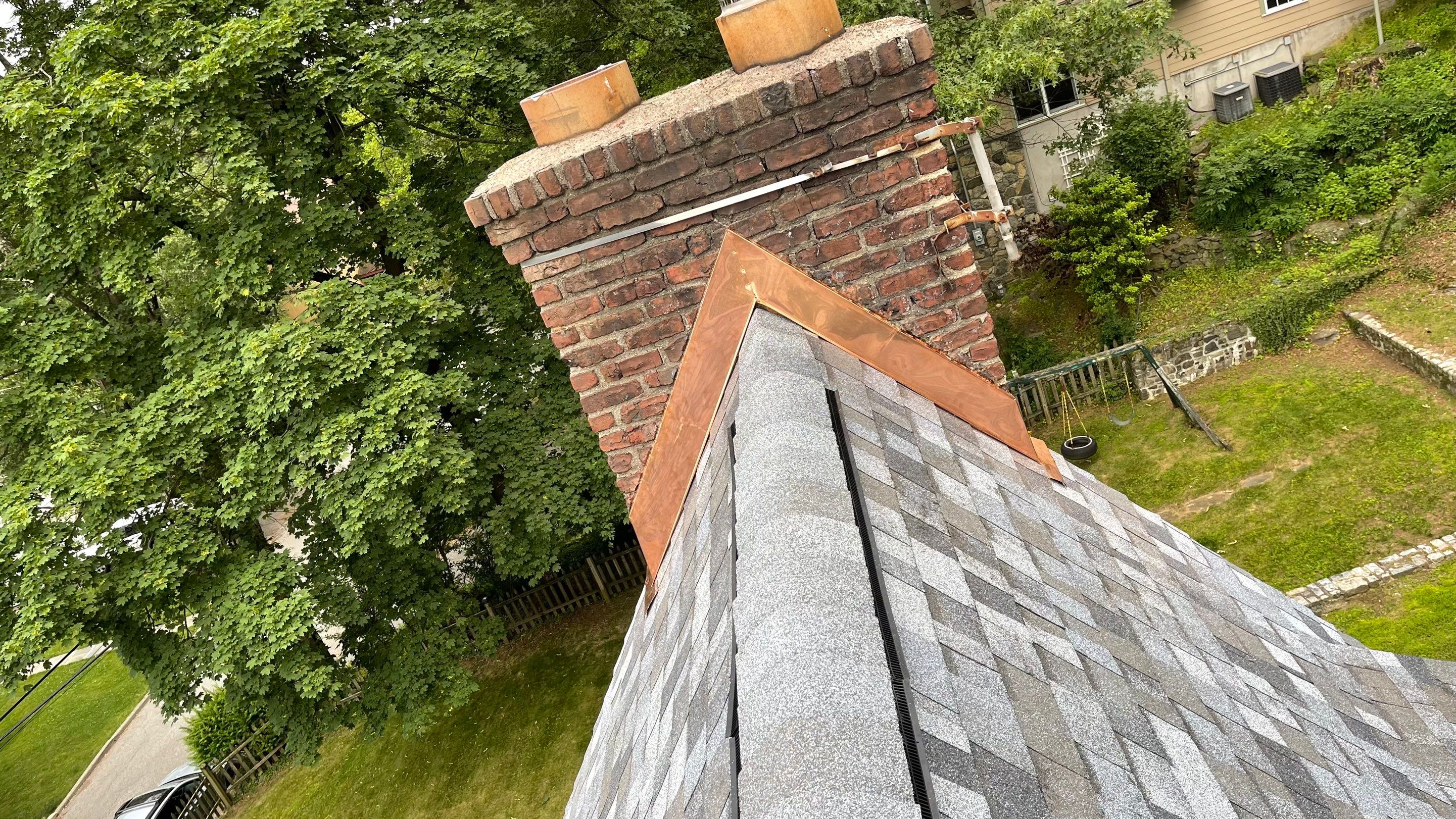 Project in Hastings-on-Hudson by The Energy Efficient Roofer & George's Seamless Gutters