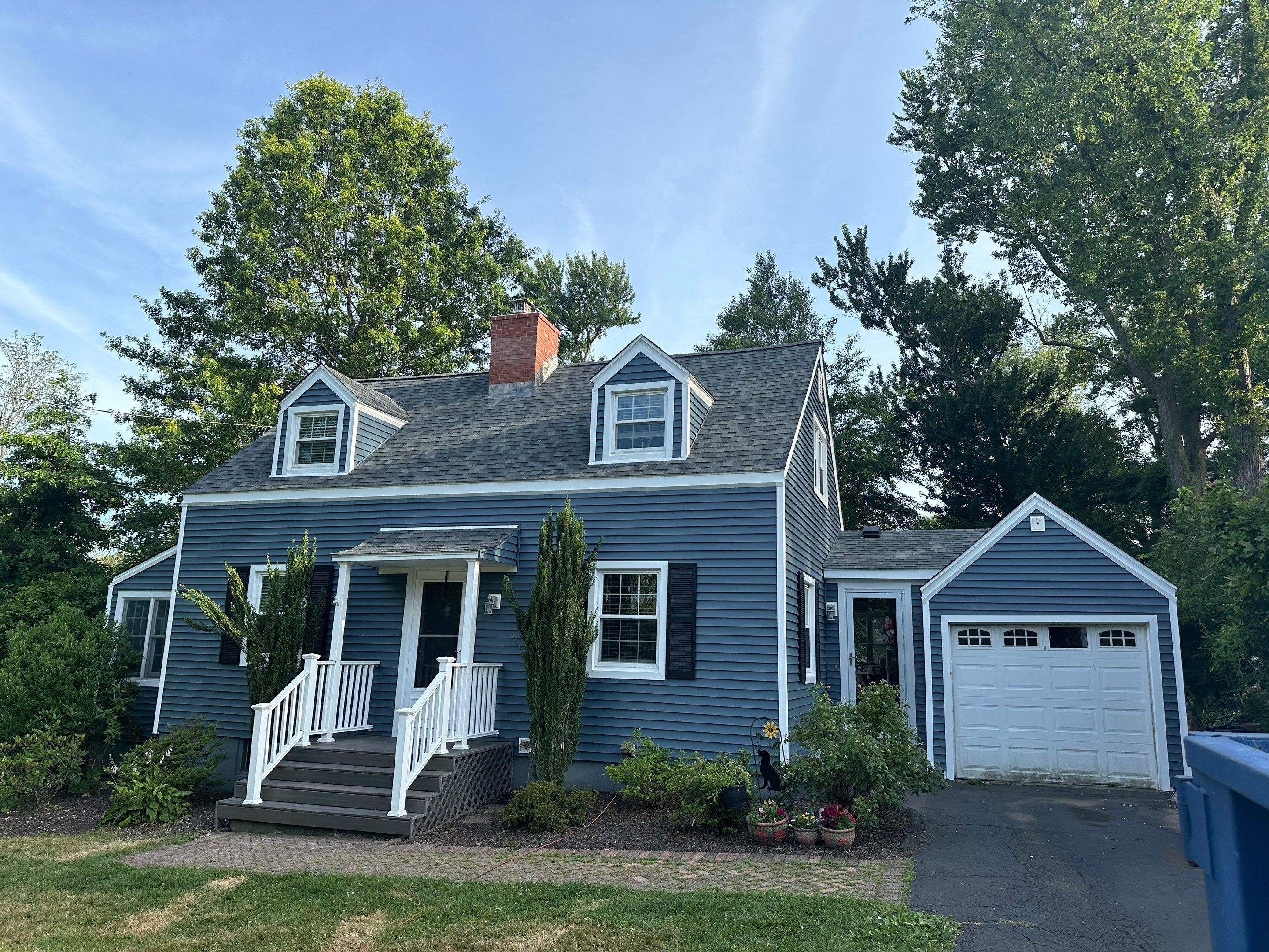 Complete Exterior Estate gray with Pacific Blue Siding by A Plus Exterior