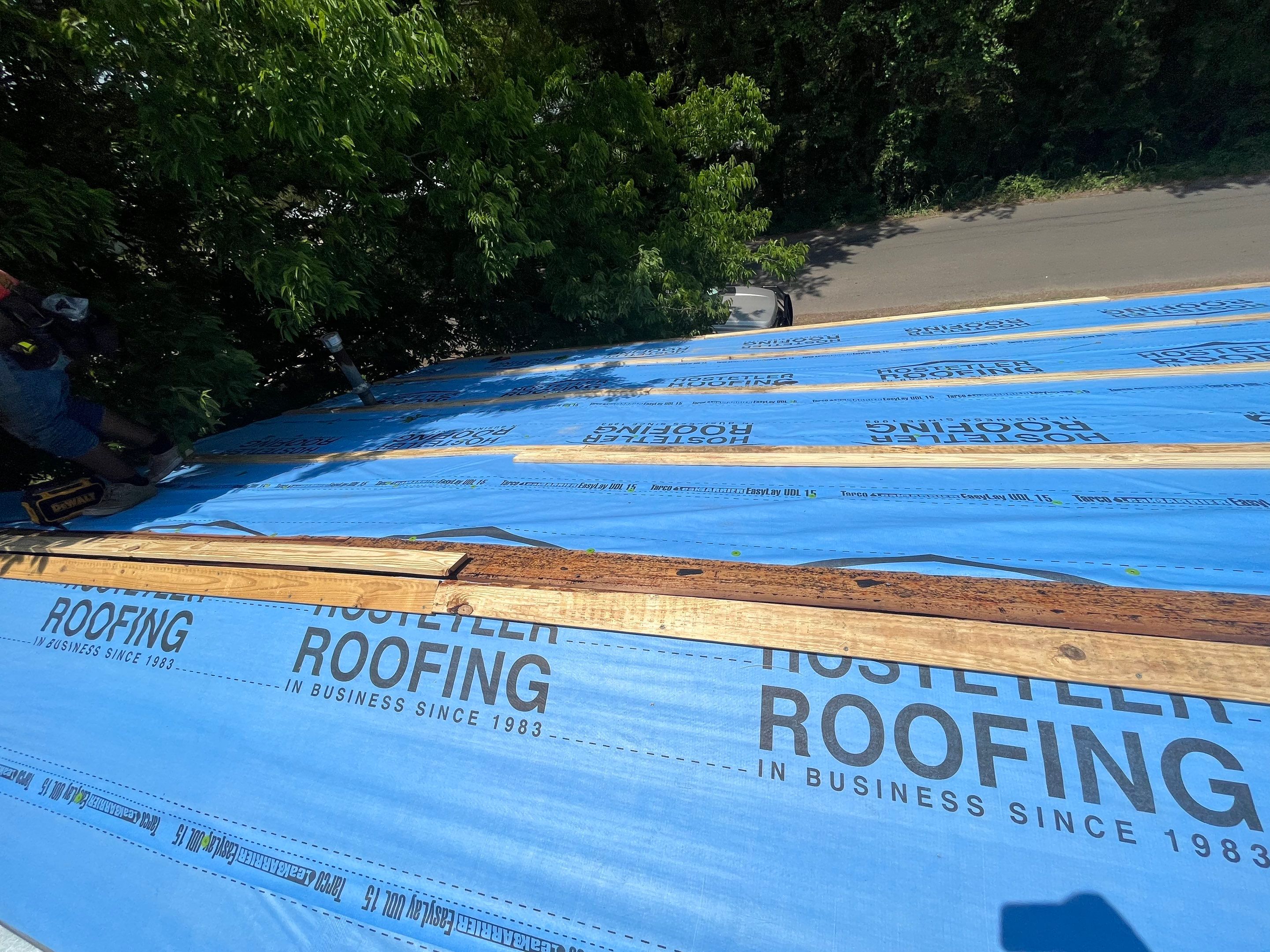 Residential Roofing Installation using 29 Gauge Galvalume Metal by Hostetler Roofing