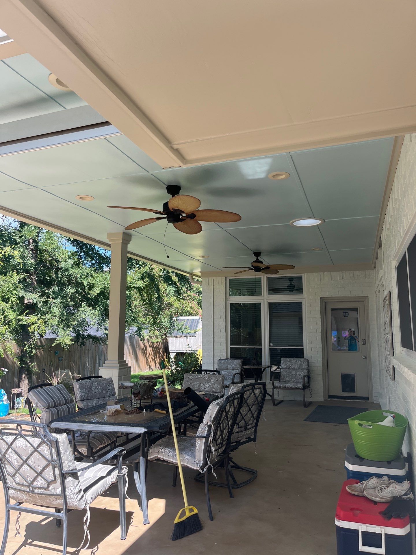Exterior Painting in Tyler, TX | Brick House with White & Blue Finish by Quality Coats Painting