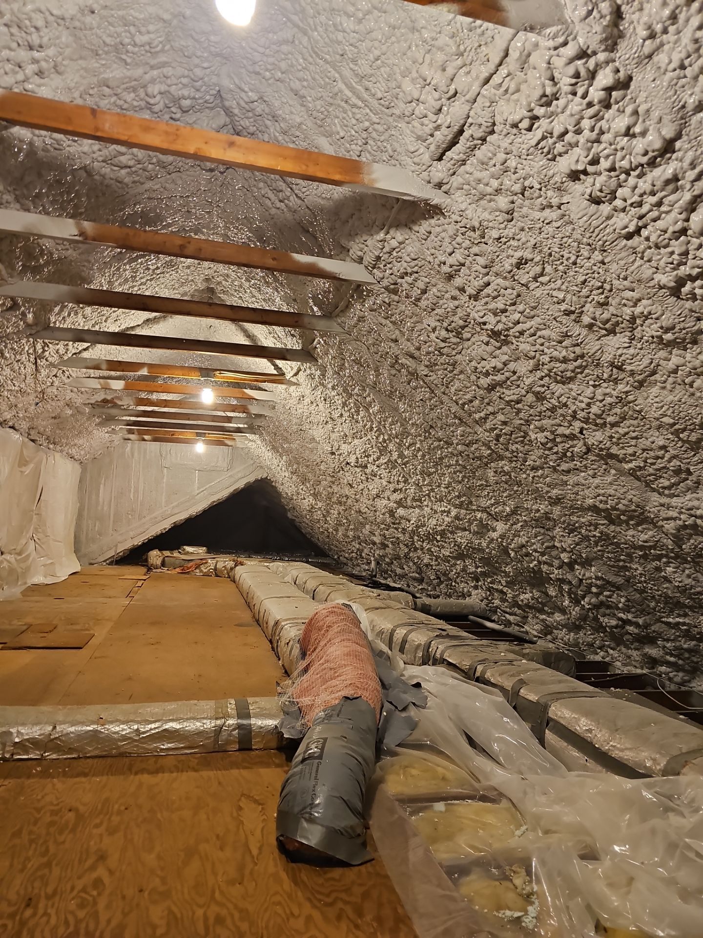 Attic Retrofit using open cell spray foam by NYS Foam & Energy